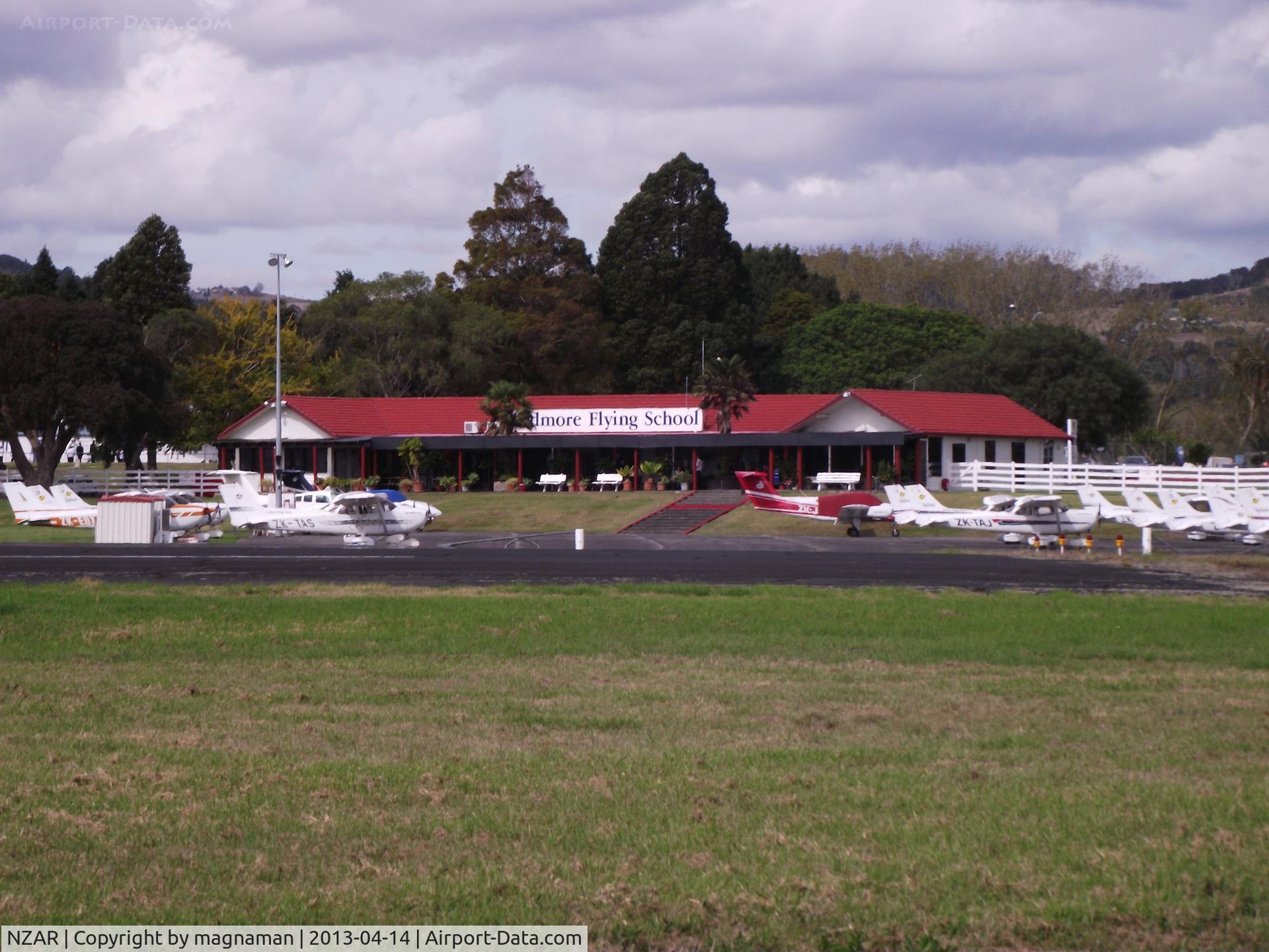 Ardmore Airport, Auckland New Zealand (NZAR) - Flying school end of airfield as seen from through road. Good place to snap landings if coming from west.