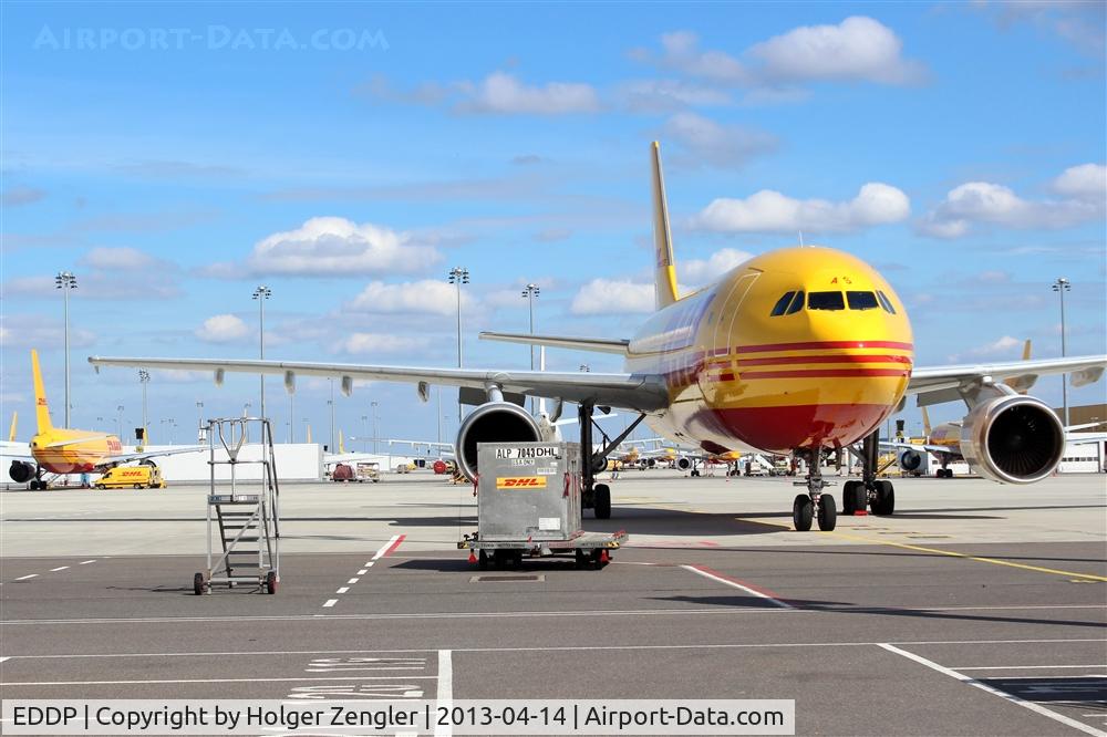 Leipzig/Halle Airport, Leipzig/Halle Germany (EDDP) - View thru the fence on apron 4 (but don´t finger me to DHL!)...