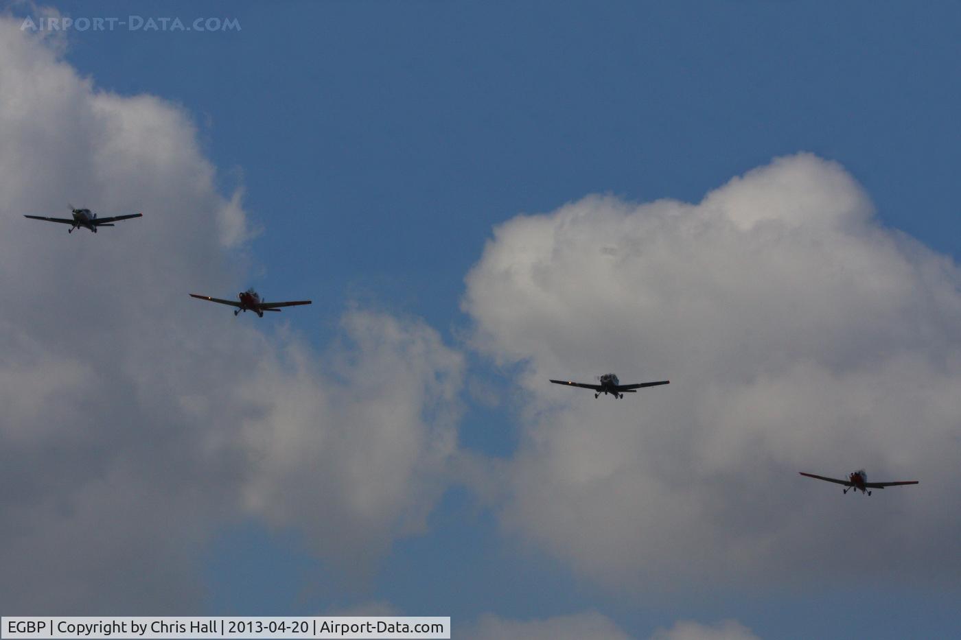 Kemble Airport, Kemble, England United Kingdom (EGBP) - four Bulldogs in formation over Kemble