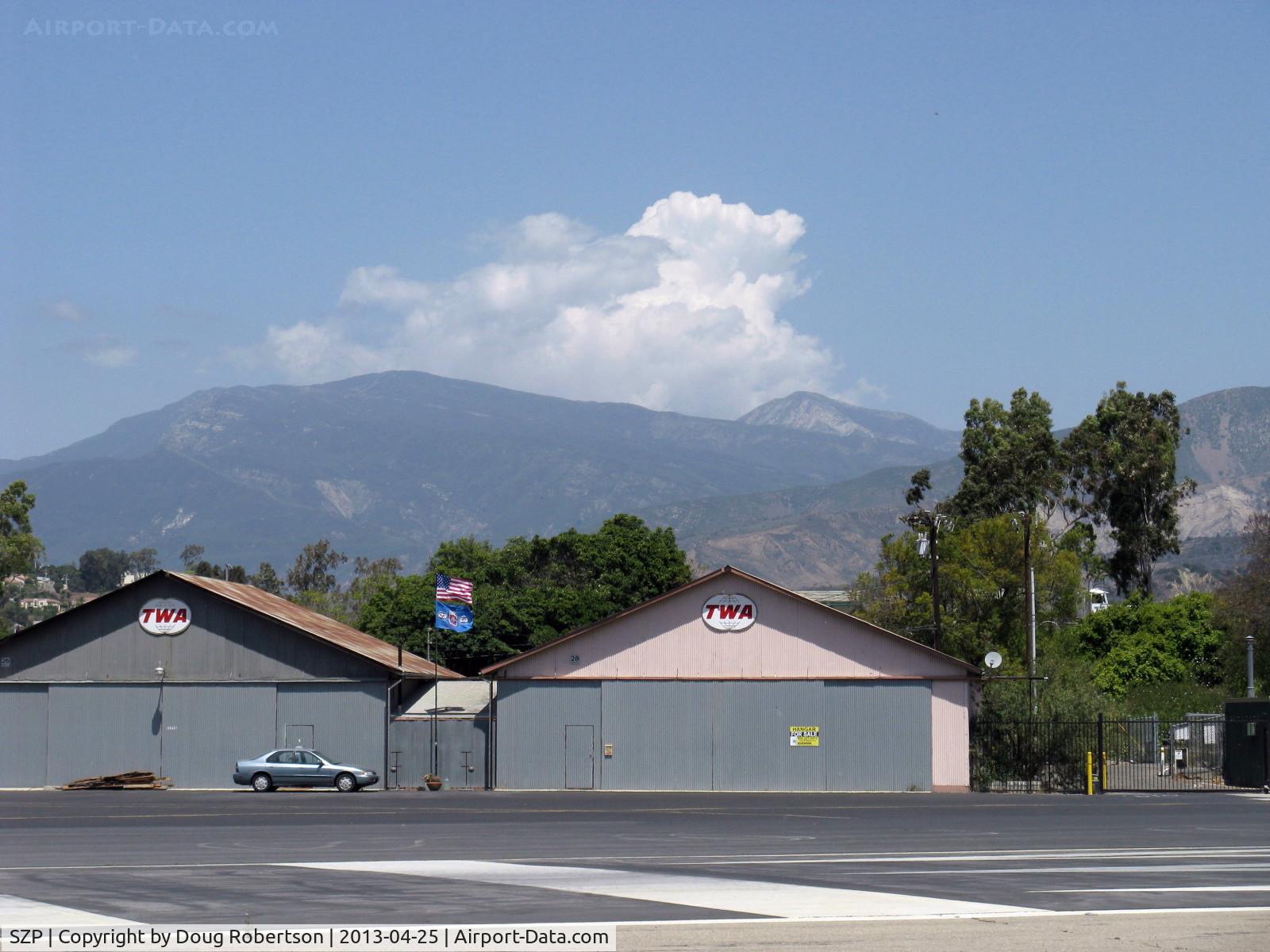 Santa Paula Airport (SZP) - Cumulus cloud building beyond 6,704' Hines Peak, taken about 15 minutes after first photo 