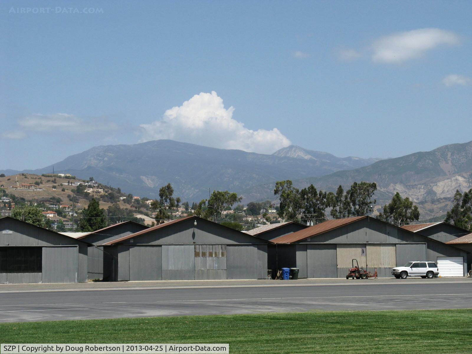 Santa Paula Airport (SZP) - Cumulus cloud building beyond 6,704' Hines Peak