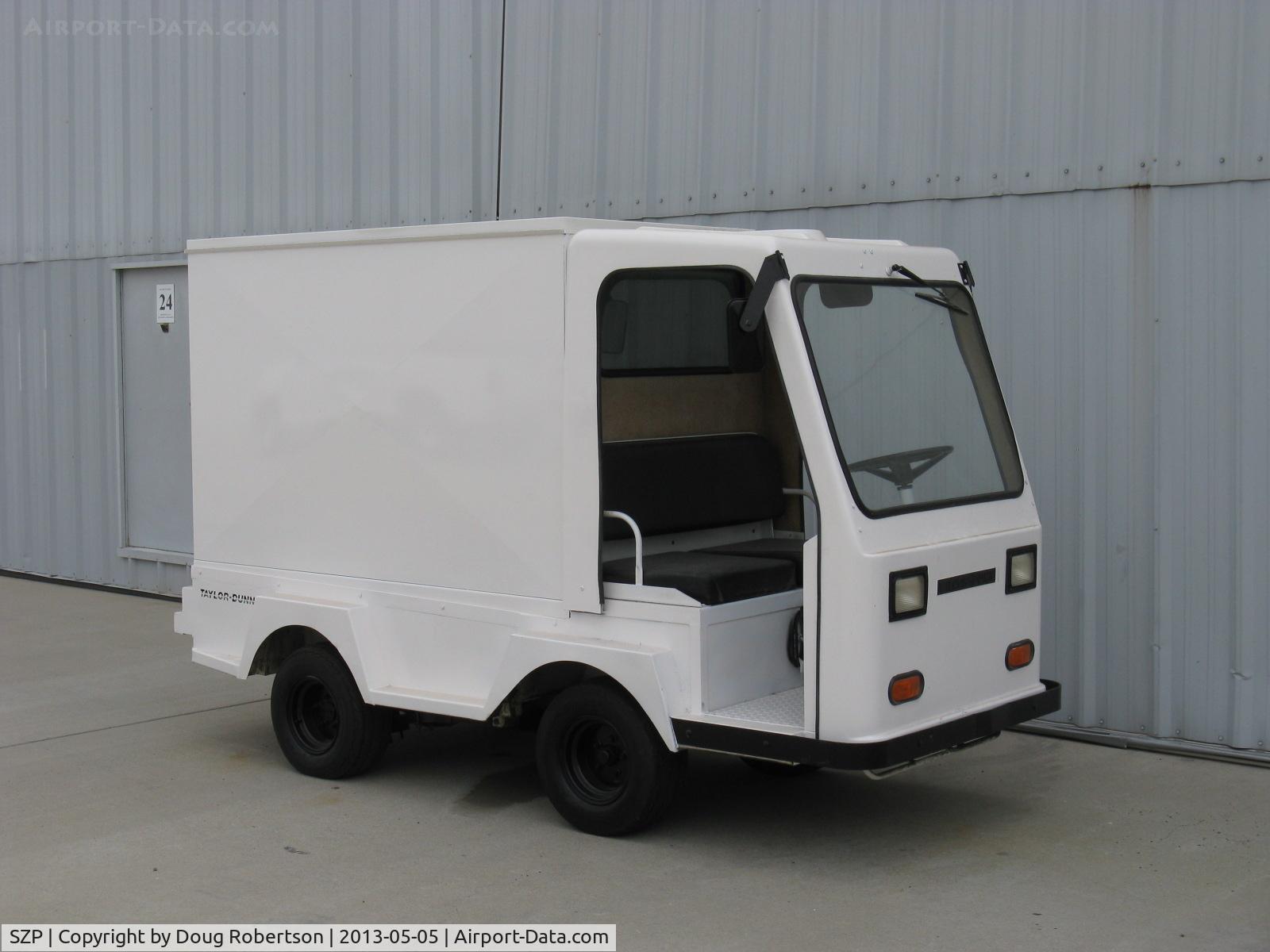 Santa Paula Airport (SZP) - The airport has many forms of personal ground transportation. Here is a Taylor-Dunn electric vehicle for two with enclosed cargo capability.