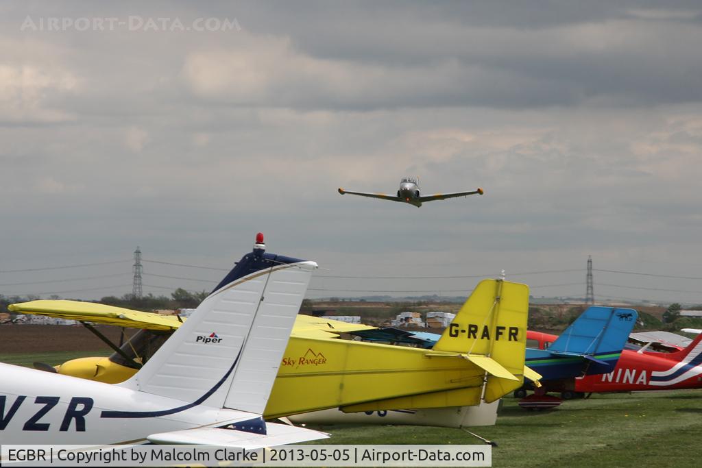 EGBR Airport - BAC 84 Jet Provost T4 G-BXLO overflies The Real Aeroplane Club's May-hem Fly-In, Breighton Airfield, May 2013.