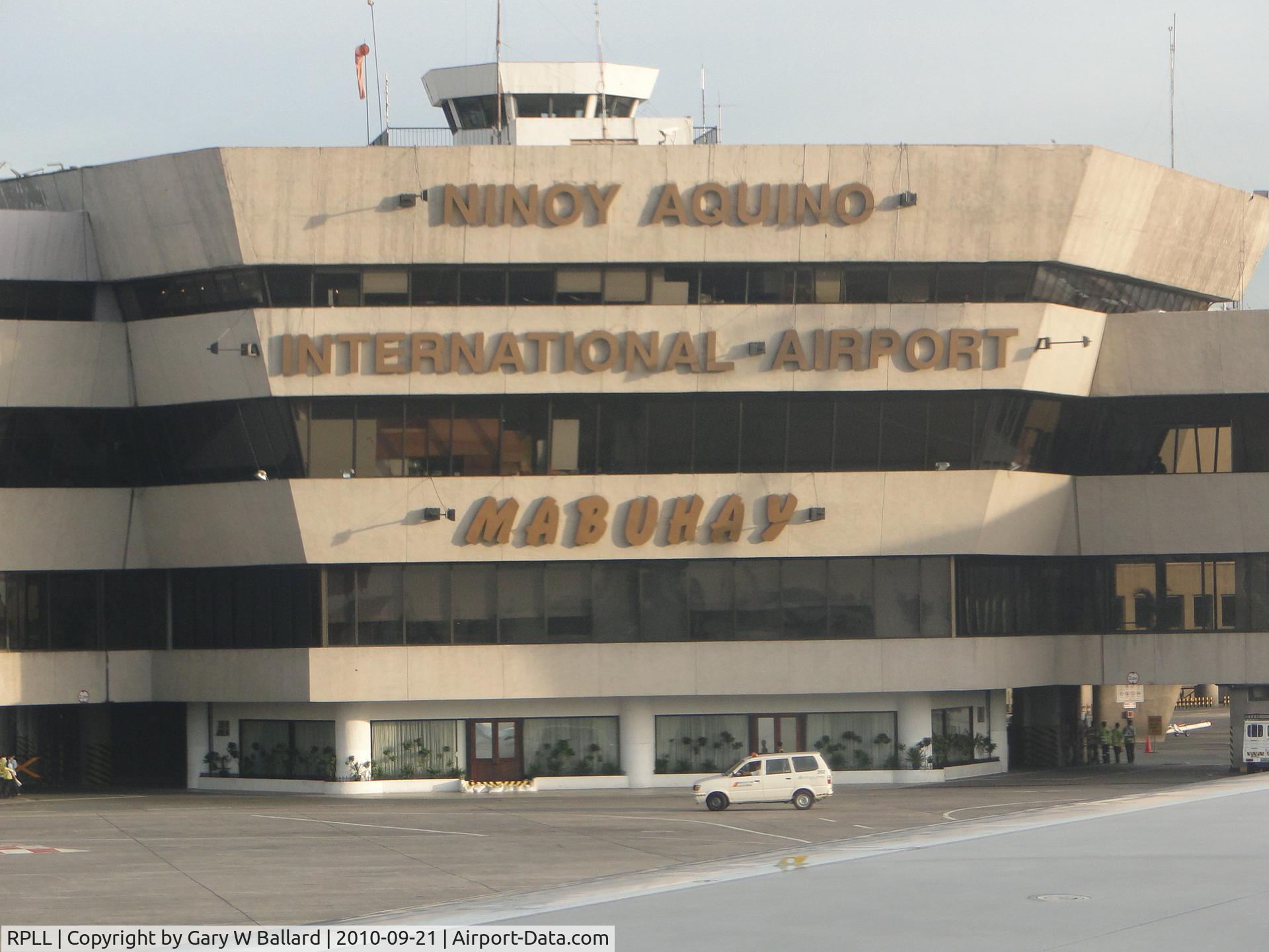 Ninoy Aquino International Airport, Manila Philippines (RPLL) - Terminal 1 as seen from Delta flight No.629 Manila - Nagoya - Detroit. Gary W Ballard photo Sept. 2010