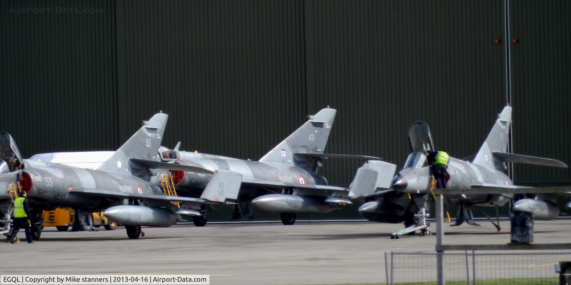 RAF Leuchars Airport, Leuchars, Scotland United Kingdom (EGQL) - 17F Super Etendard's 55,43 & 17 sitting outside the hanger ready to be placed into the hanger, due to 40mph cross winds which resulted in all flying being grounded during exercise joint warrior 13-1 
