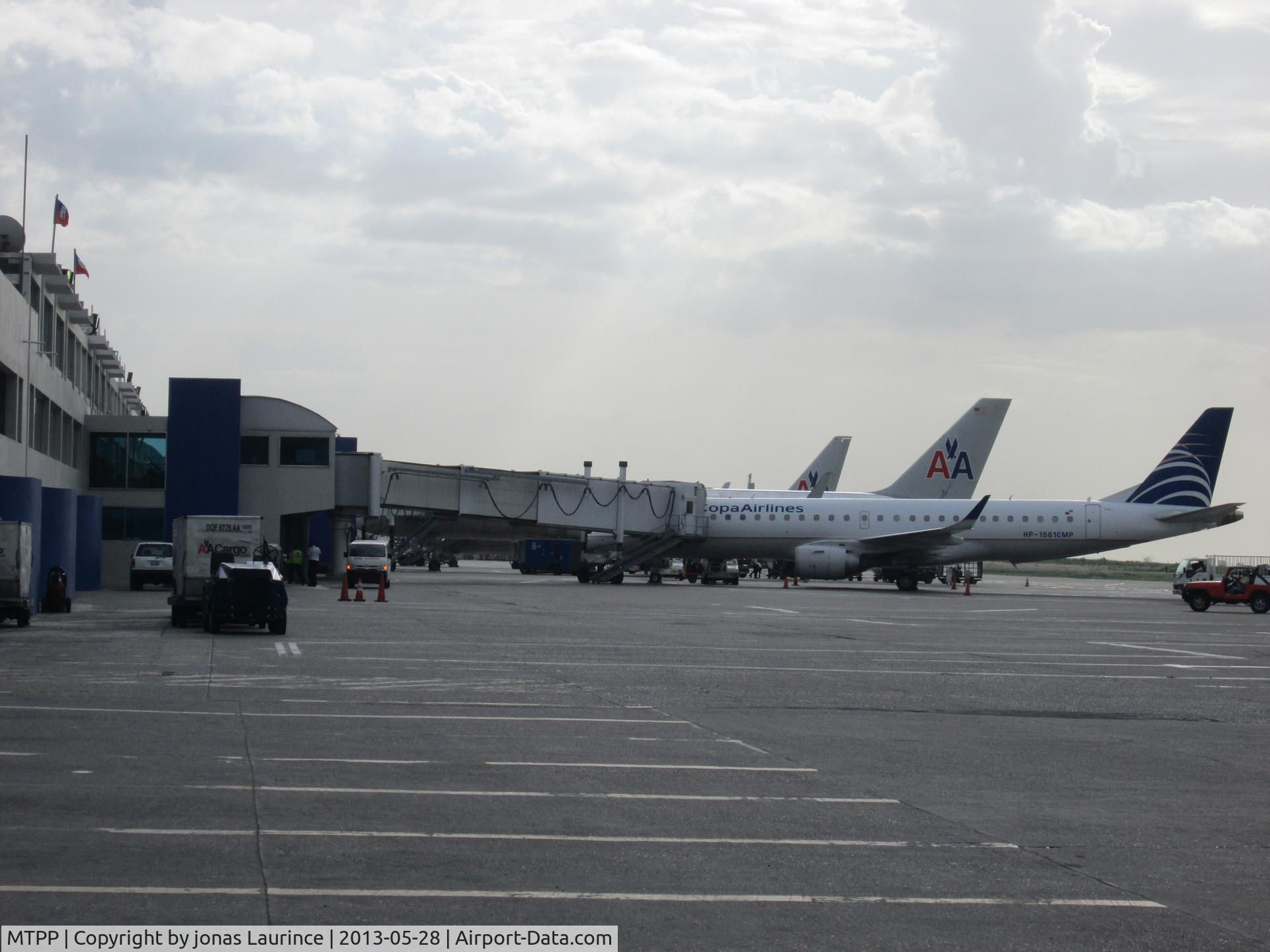 Port-au-Prince International Airport (Toussaint Louverture Int'l), Port-au-Prince Haiti (MTPP) - American Airlines and Copa Airline aircrafts boarding at the Toussaint Louverture International Airport of Port-au-Prince