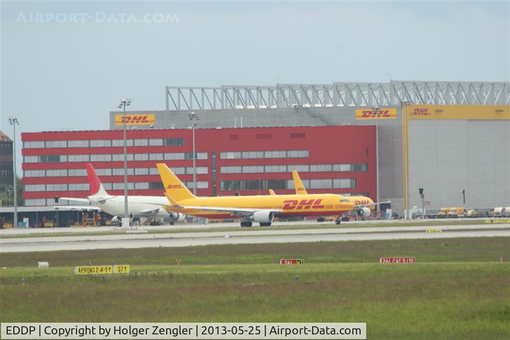 Leipzig/Halle Airport, Leipzig/Halle Germany (EDDP) - Everybody is enjoying weekend quiescence but one unfortunate plane has to go to a far destination.....