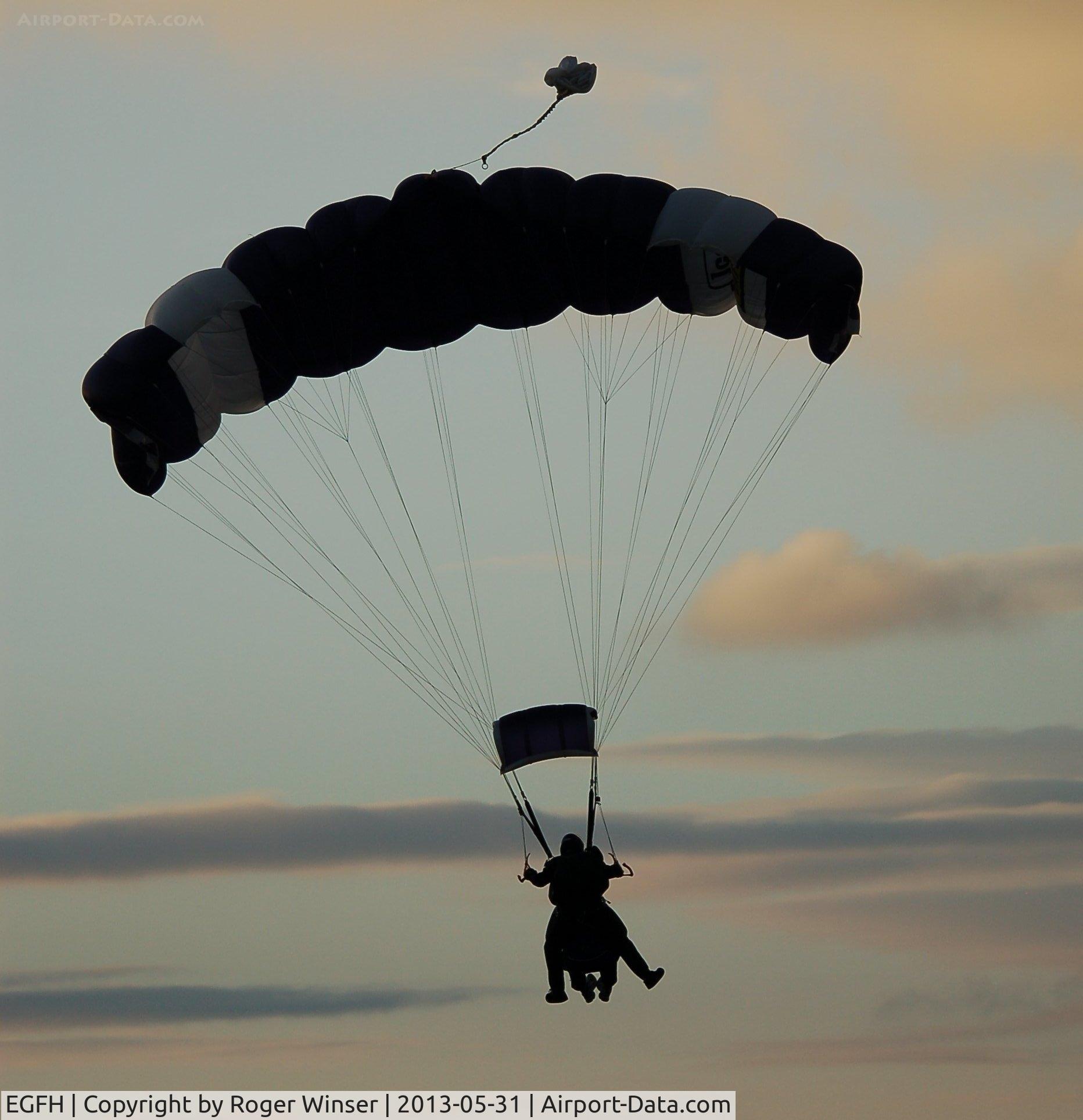 Swansea Airport, Swansea, Wales United Kingdom (EGFH) - Sunset drop organised by Skydive Swansea to mark the final day of the Heroes Challenge UK 1283 mile fund raising cycle ride from John O'Groats to Lands End.