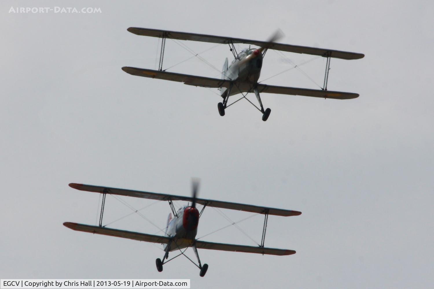 Sleap Airfield Airport, Shrewsbury, England United Kingdom (EGCV) - CASA 1-131E Jungmann's G-BZJV and G-CDJU displaying at the Vintage Aircraft flyin, Sleap