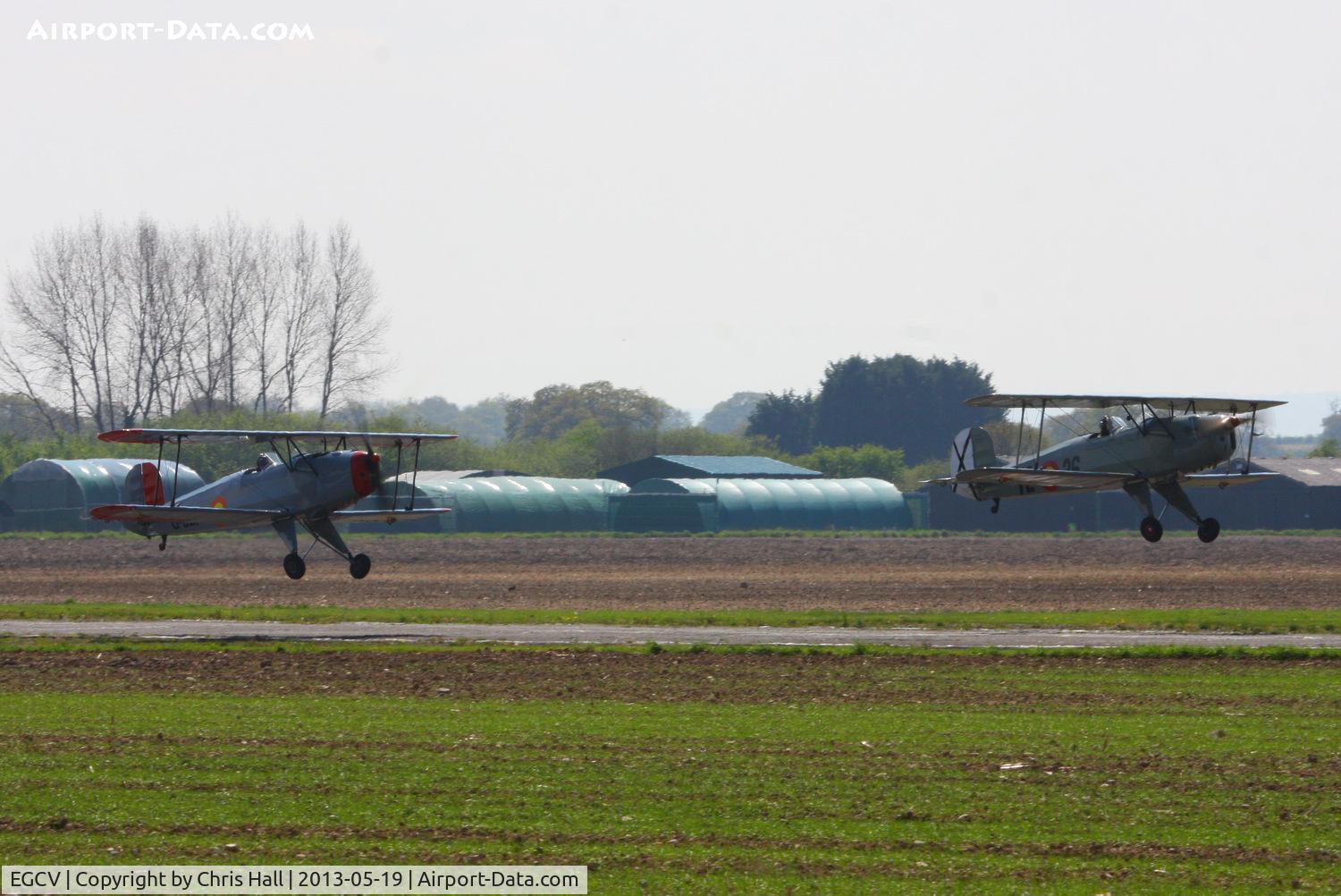 Sleap Airfield Airport, Shrewsbury, England United Kingdom (EGCV) - CASA 1-131E Jungmann's G-BZJV and G-CDJU displaying at the Vintage Aircraft flyin, Sleap