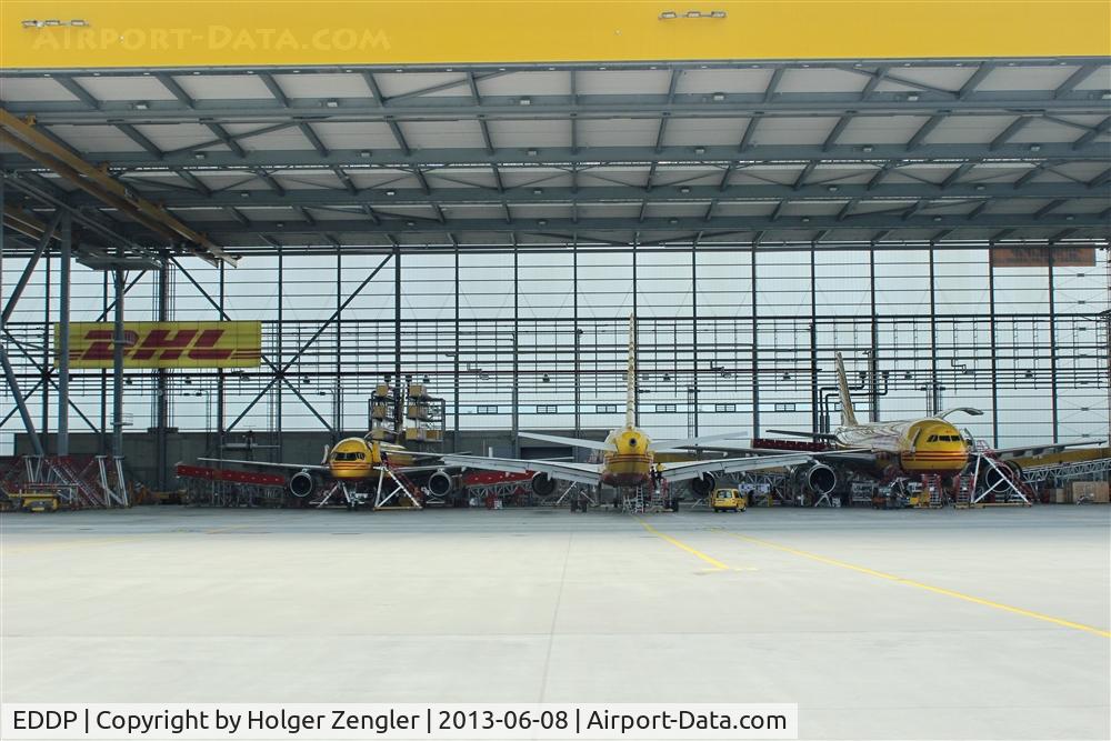 Leipzig/Halle Airport, Leipzig/Halle Germany (EDDP) - No.1000 of my airport pics is dedicated to DHL which always offers a good scene to me (currently a view into a well filled hangar)....