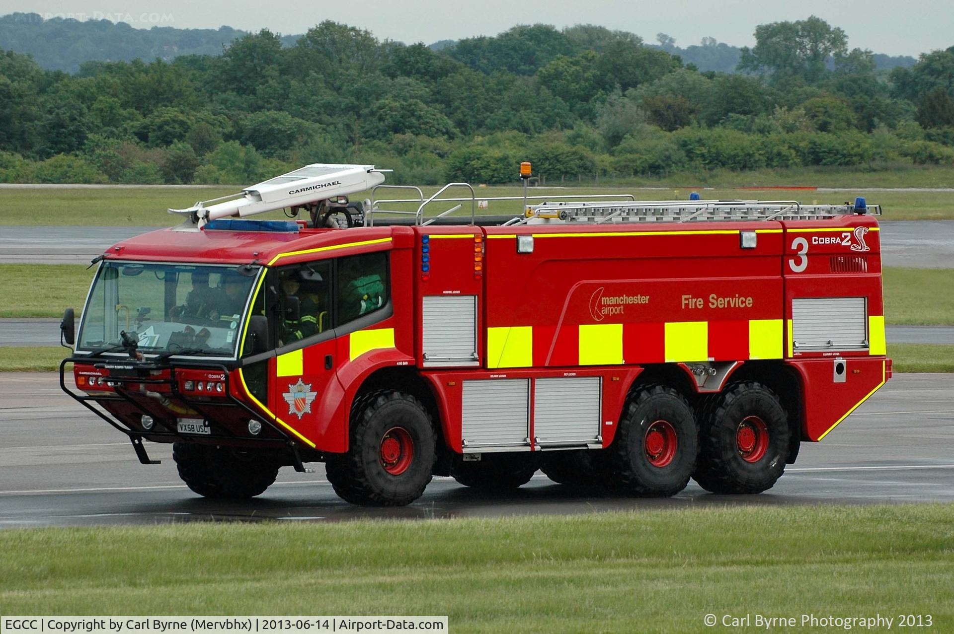 Manchester Airport, Manchester, England United Kingdom (EGCC) - One of the Manchester Airport fire tenders.