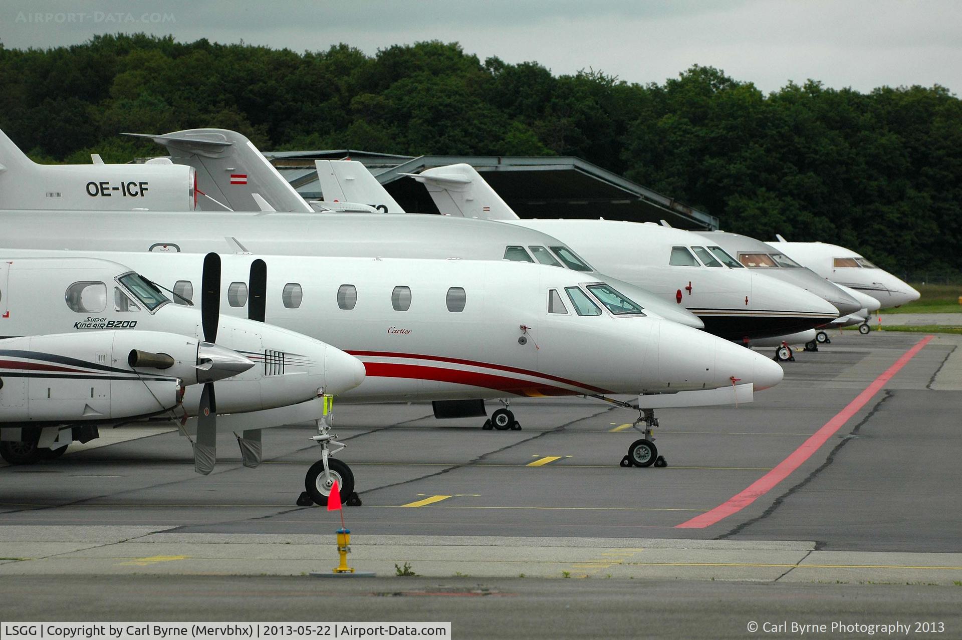 Geneva Cointrin International Airport, Geneva Switzerland (LSGG) - A line up of aircraft on the RUAG ramp