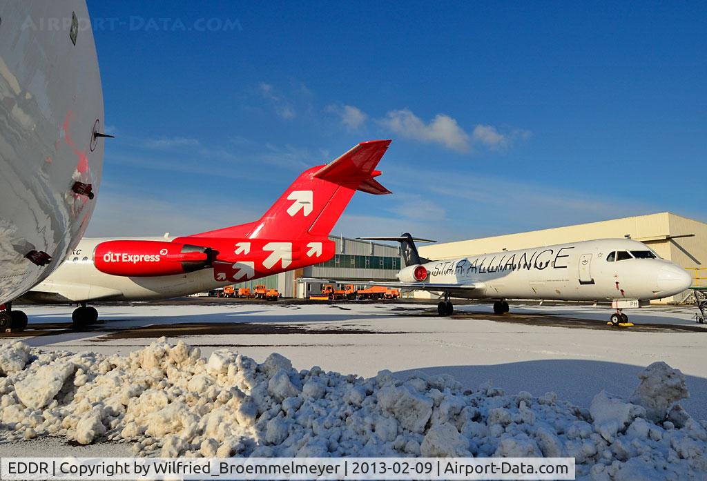 Saarbrücken Airport, Saarbrücken Germany (EDDR) - OLT Express Germany Fokker 100 Fleet stored at EDDR/SCN after bankruptcy.