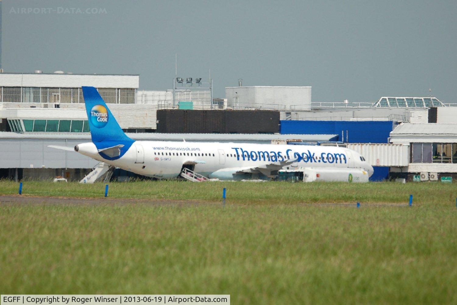 Cardiff International Airport, Cardiff, Wales United Kingdom (EGFF) - A321 loading at the pier.