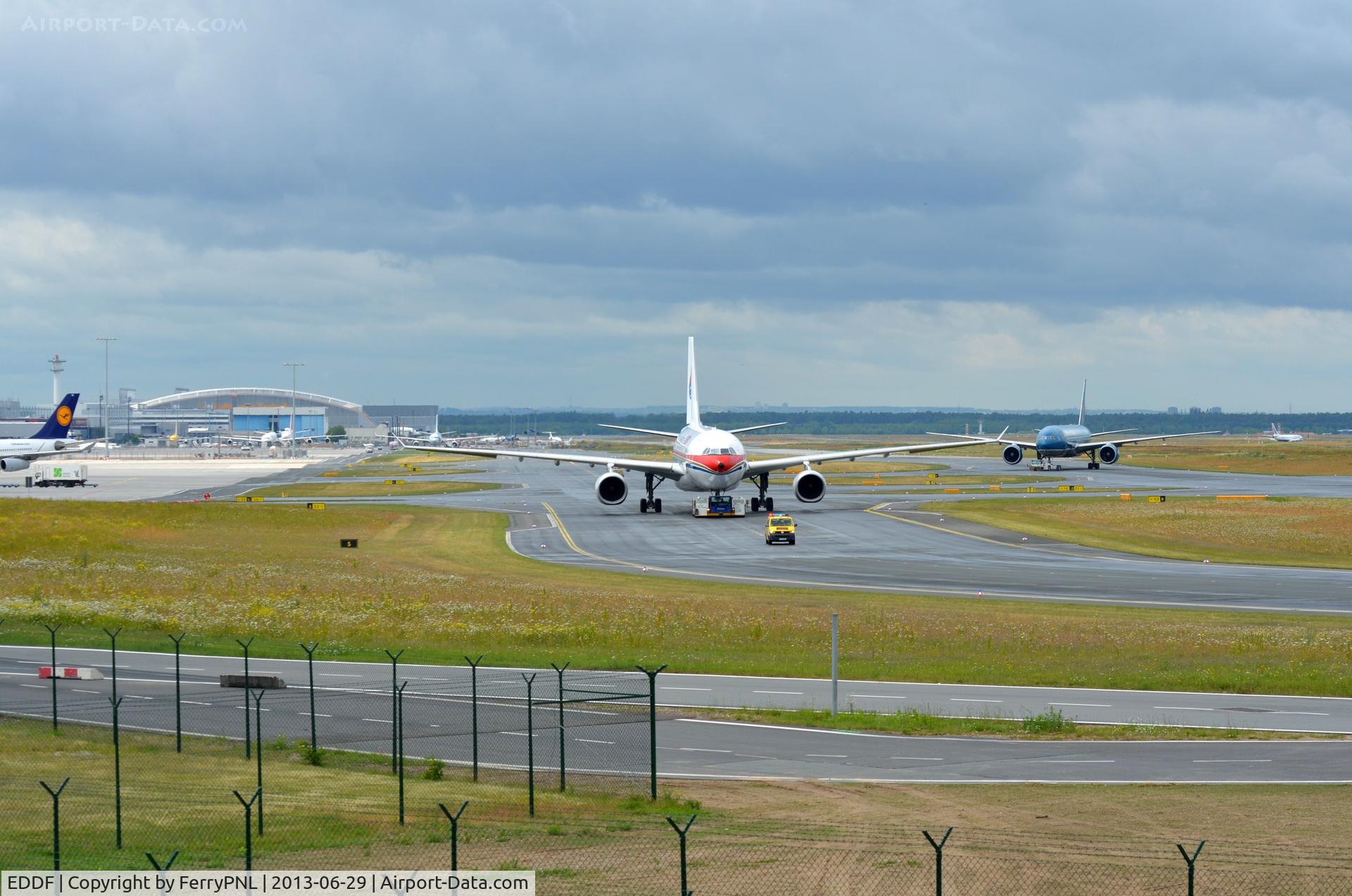 Frankfurt International Airport, Frankfurt am Main Germany (EDDF) - Spotting location Zeppelinheim next to the A5 highway. At around 12.30 PM the parked aircraft from the south side are one by one towed to the terminal.