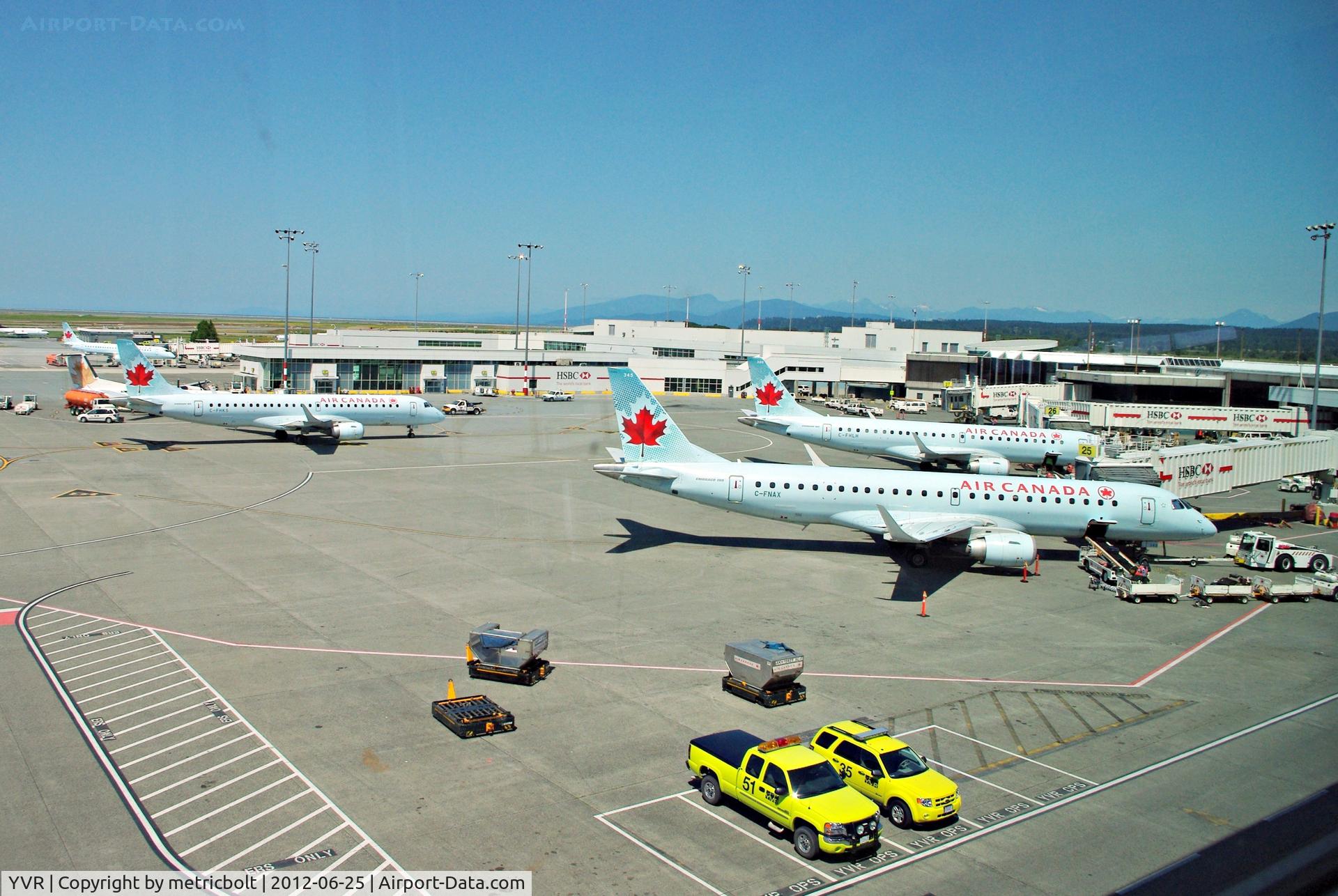 Vancouver International Airport, Vancouver, British Columbia Canada (YVR) - Embraers on the ramp