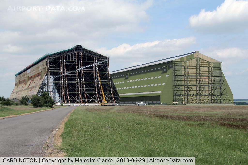 CARDINGTON Airport - Cardington's restored No 2 hangar on the right and the No 1 hangar currently under renovation. RAF Cardington (closed), June 29th 2013.