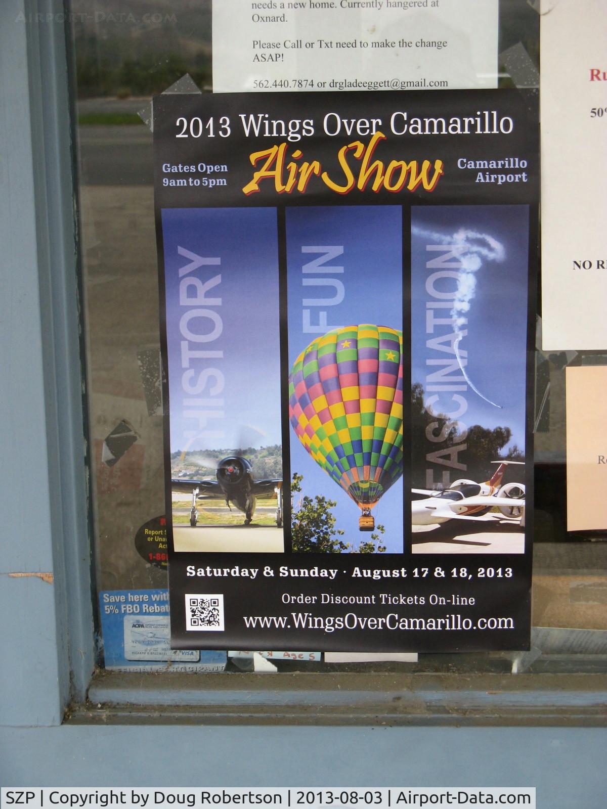 Santa Paula Airport (SZP) - Office poster advertising the 2013 Wings Over Camarillo Air Show-17-18 August at CMA. N157LB 2001 Lindstrand 90A Balloon, AX-8 class illustrated in center panel. More airshow info in the A-D Forum under Events.