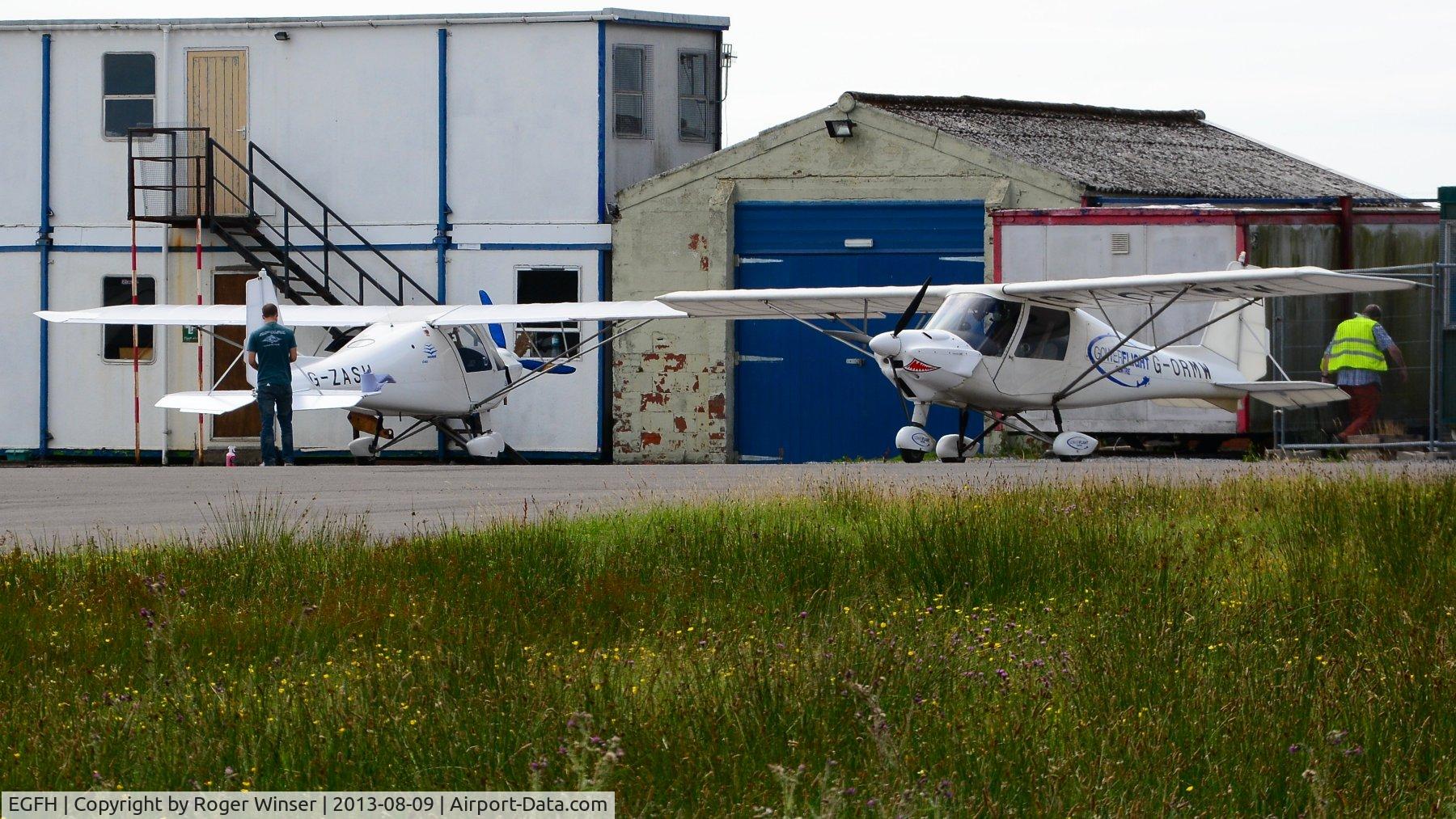 Swansea Airport, Swansea, Wales United Kingdom (EGFH) - Resident Ikarus C42 microlight aircraft operated by the Gower Flight Centre.