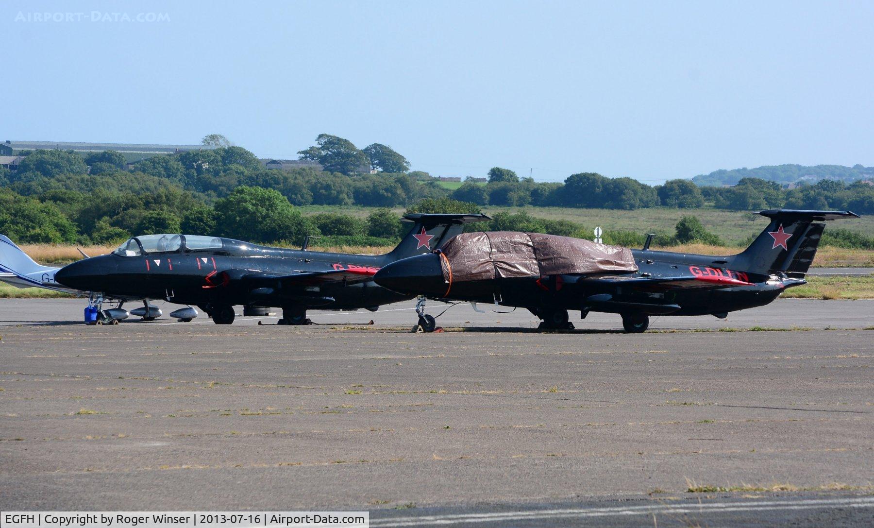 Swansea Airport, Swansea, Wales United Kingdom (EGFH) - Visiting Aero L-29 Delfins of the Red Star Rebels during a stop over at Swansea Airport.