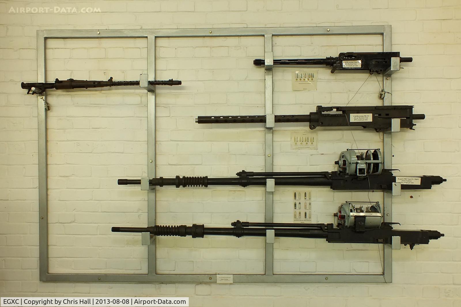 RAF Coningsby Airport, Coningsby, England United Kingdom (EGXC) - Display of Armament fitted to the Spitfire, 0.303 in Browning machine gun, 50 in M2 Browning machine gun, 20 mm Hispano Mk II cannon. on the left is a German 7.92 mm MG 15 machine gun used in the He 111