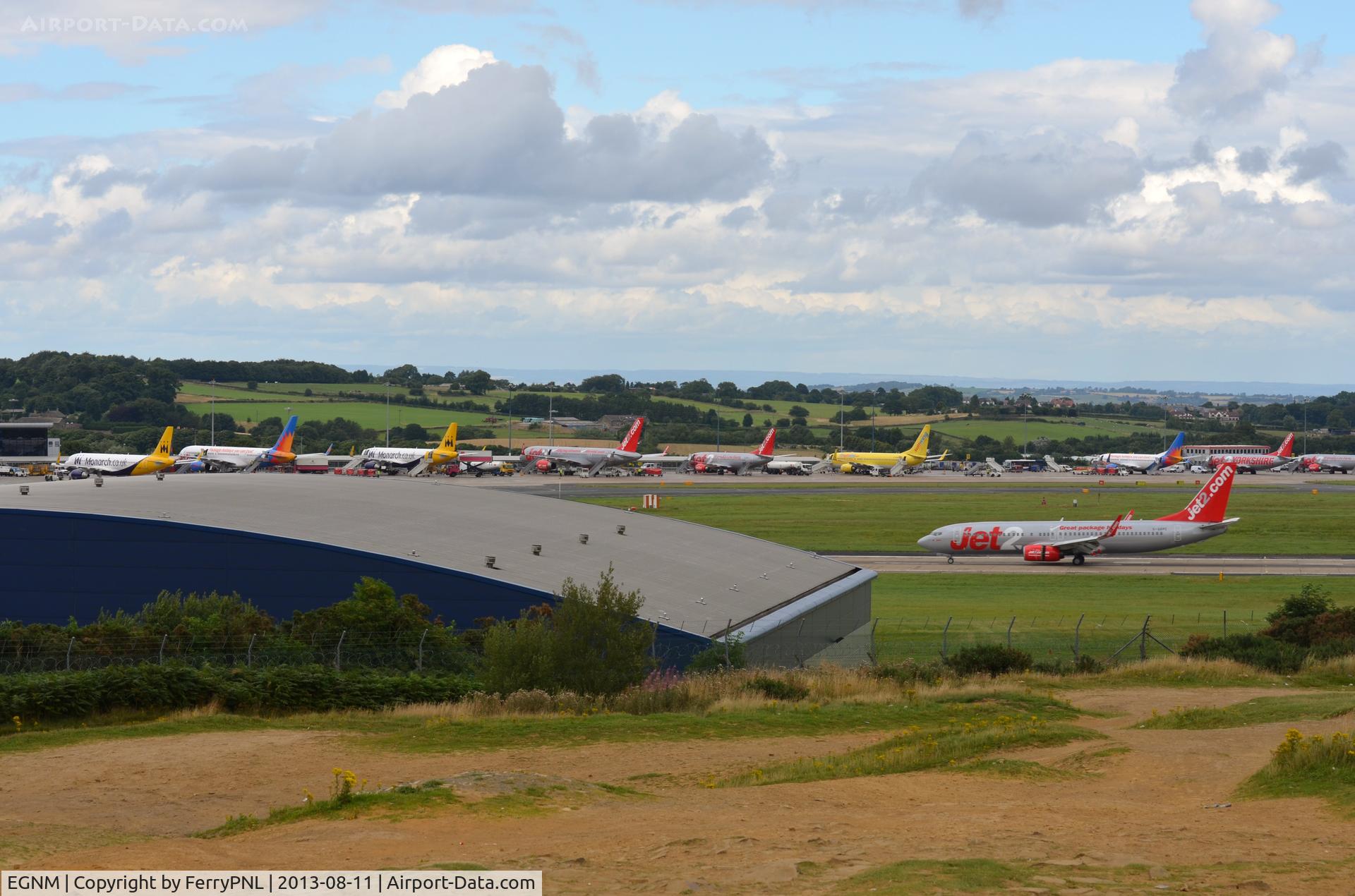 Leeds Bradford International Airport, West Yorkshire, England United Kingdom (EGNM) - Overview of LBA apron during sunday afternoon rush hour.