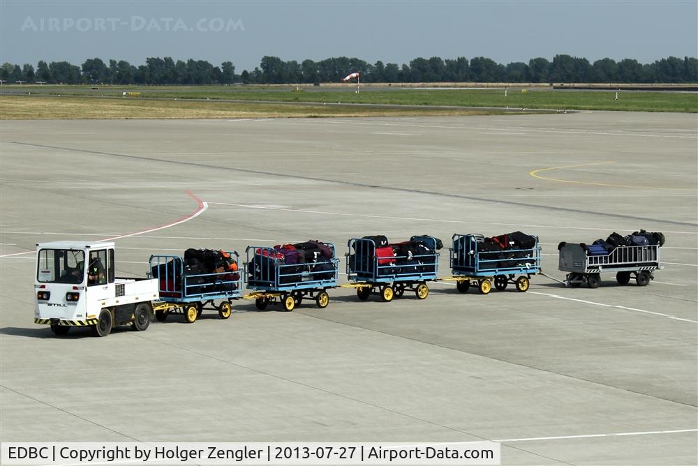 EDBC Airport - Luggage follows debarking passengers...