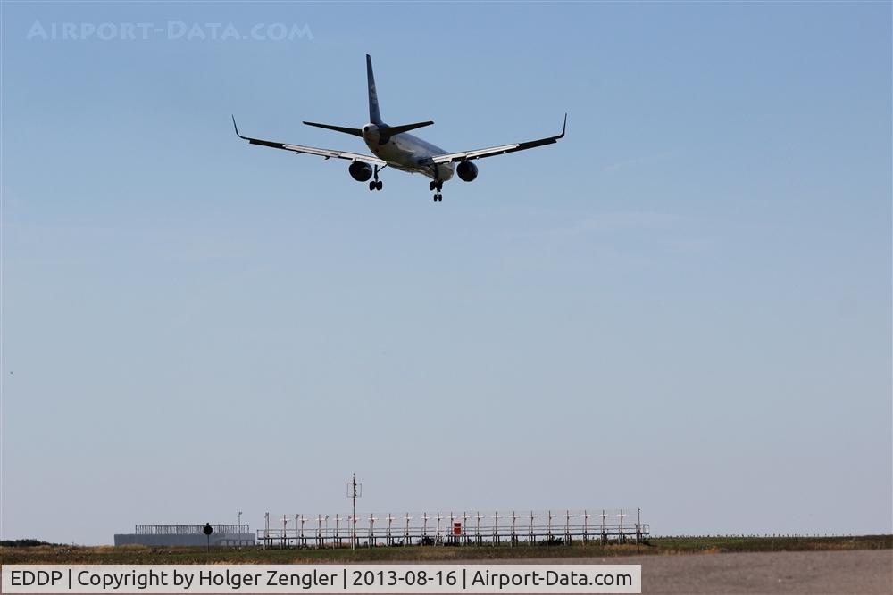 Leipzig/Halle Airport, Leipzig/Halle Germany (EDDP) - View thru gate 62 along final area of rwy 26R. New hangar at apron 3 in behind.....