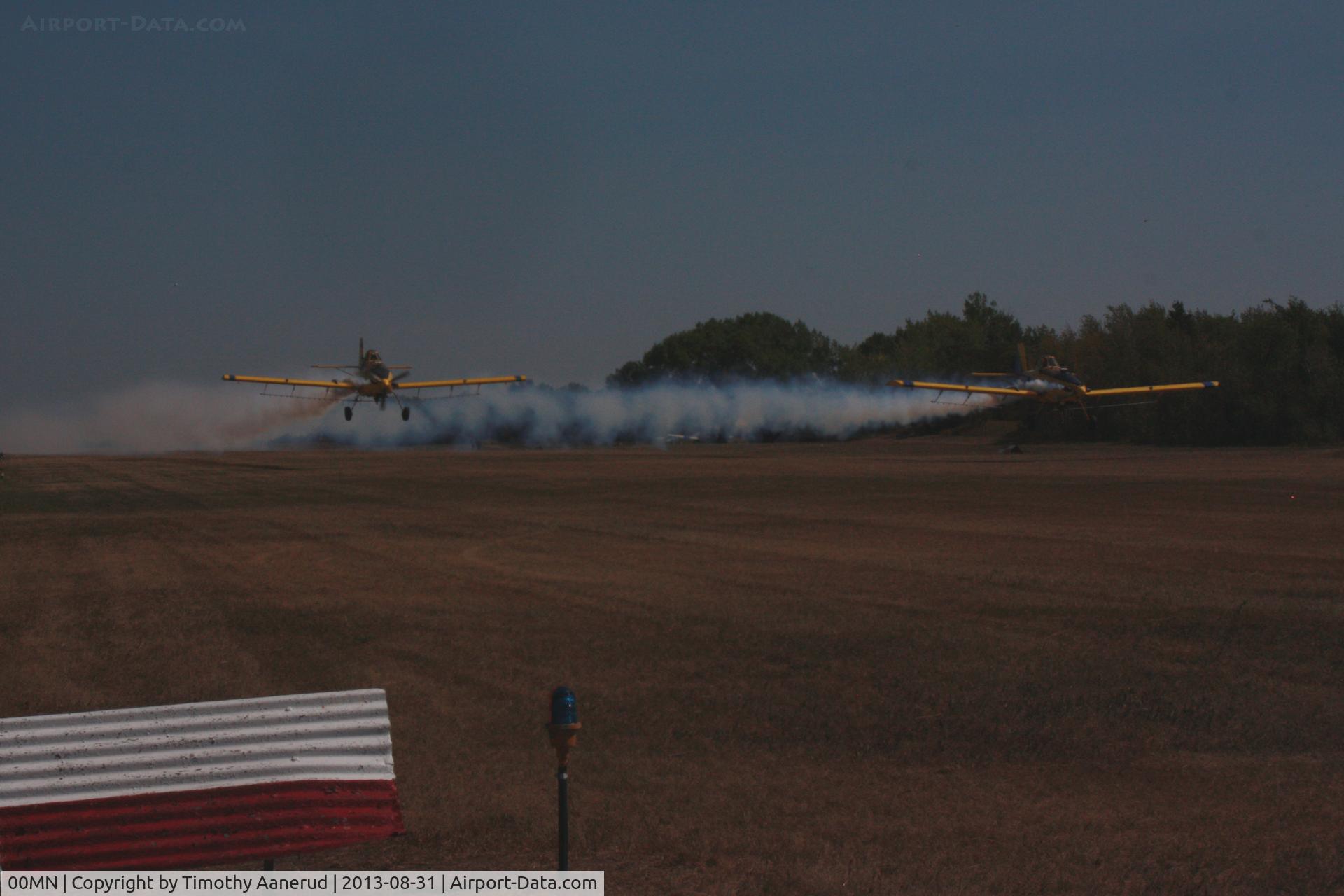 Battle Lake Municipal Airport (00MN) - Air Tractors N45453 and N6072X making a low pass