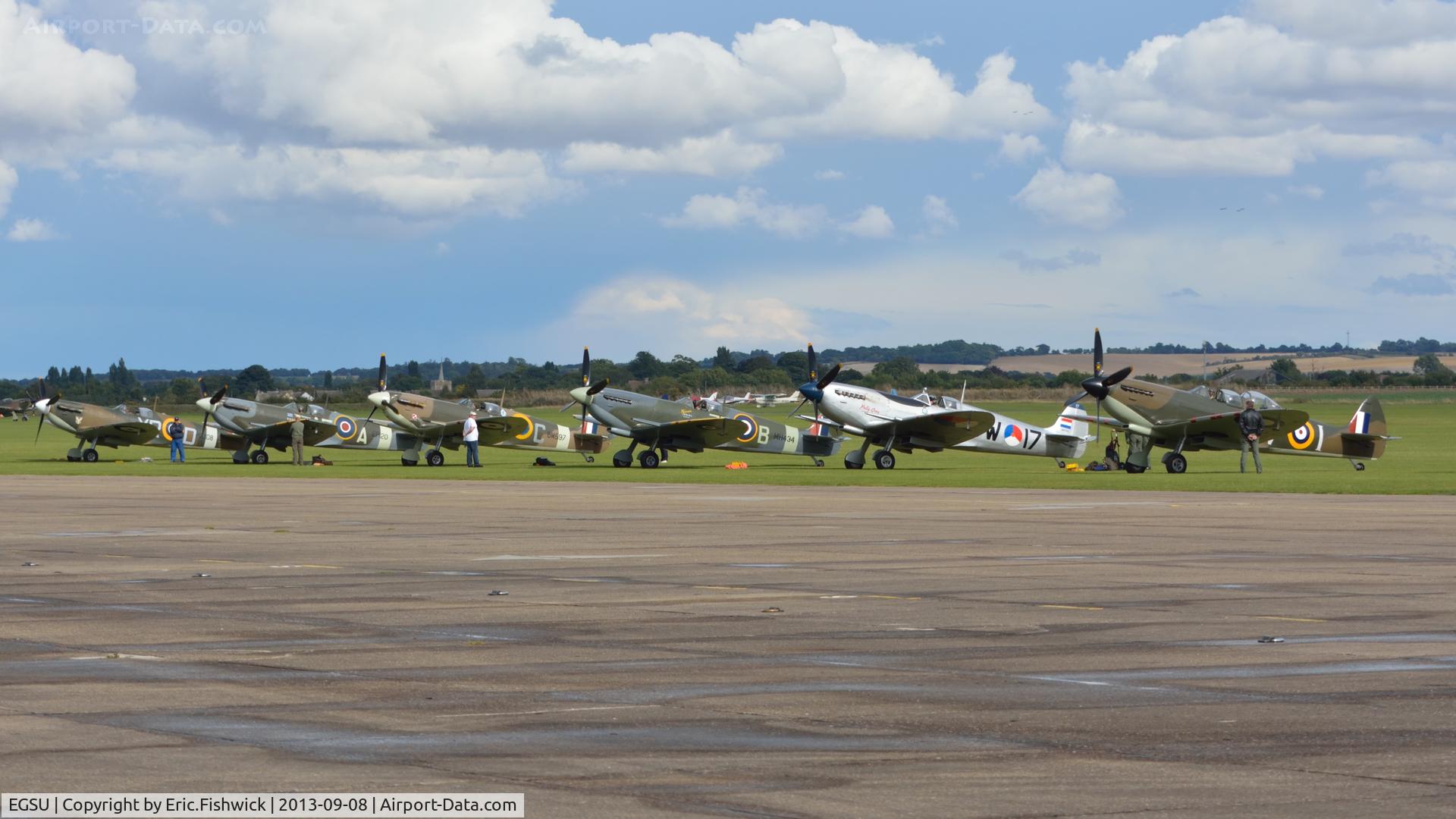 Duxford Airport, Cambridge, England United Kingdom (EGSU) - Six magnificent Spitfires preparing to display at Duxford Air Show, Sept. 2013.