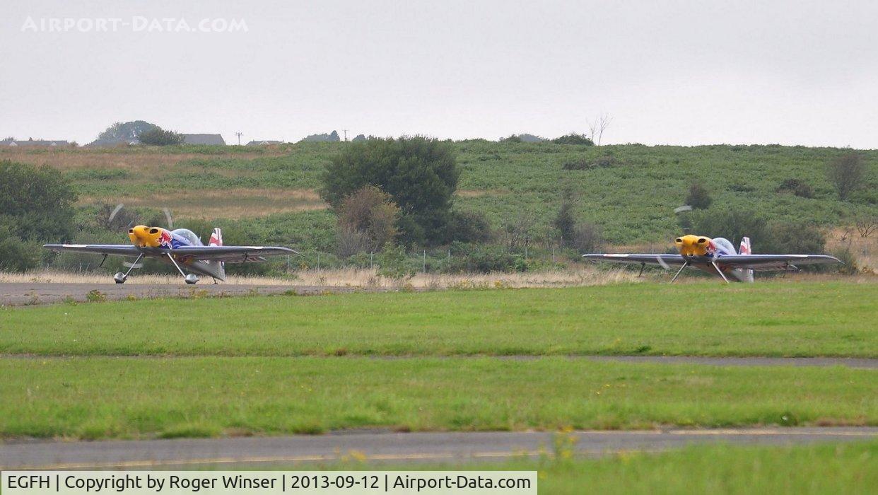 Swansea Airport, Swansea, Wales United Kingdom (EGFH) - Visiting ExtremeAir XA-41's of the Red Bull Matadors about to depart Runway 22.