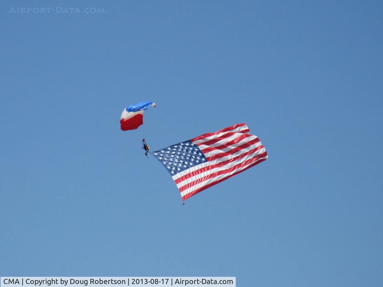 Camarillo Airport (CMA) - Parachute jumper opening Wings Over Camarillo Airshow 2013 with OLD GLORY
