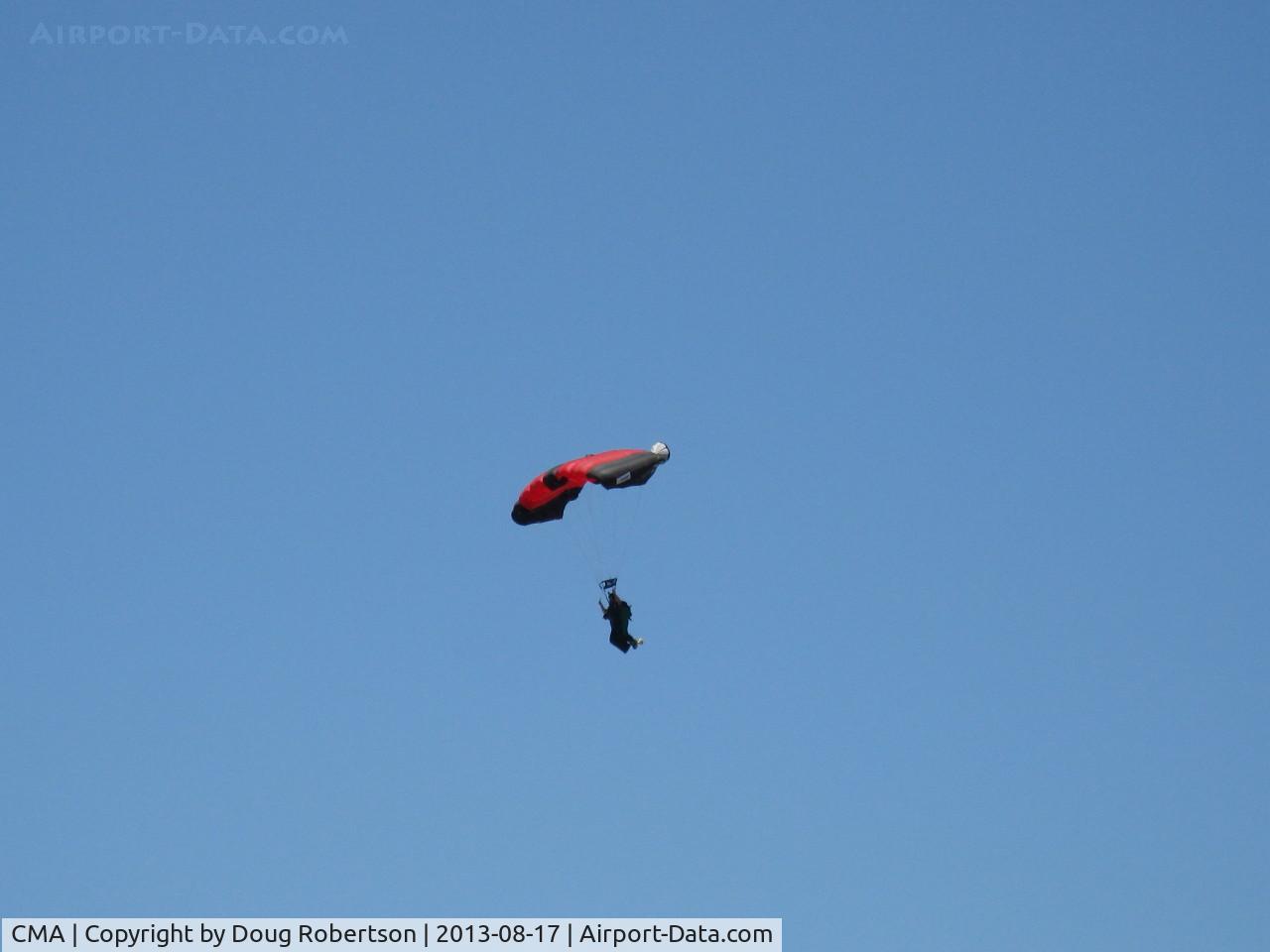 Camarillo Airport (CMA) - Three parachute jumpers opened the Wings Over Camarillo Airshow 2013. This is one of them near landing.
