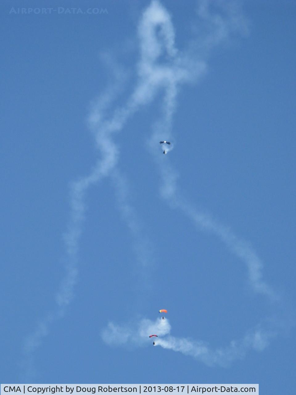 Camarillo Airport (CMA) - Three parachutists doing stunts with smoke opening the Wings Over Camarillo Airshow 2013
