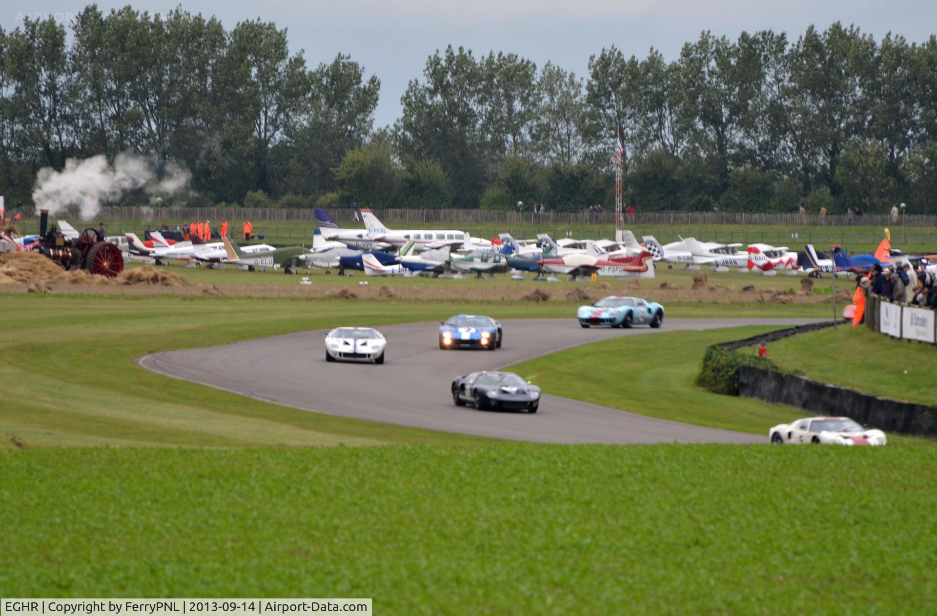 Goodwood Airfield Airport, Chichester, England United Kingdom (EGHR) - Goodwood Aerodrome is located near Chichester in the South of England. The perimeter road was converted to a world renowned racetrack in 1948 and is now used for the yearly Revival and Festival of Speed weekends.