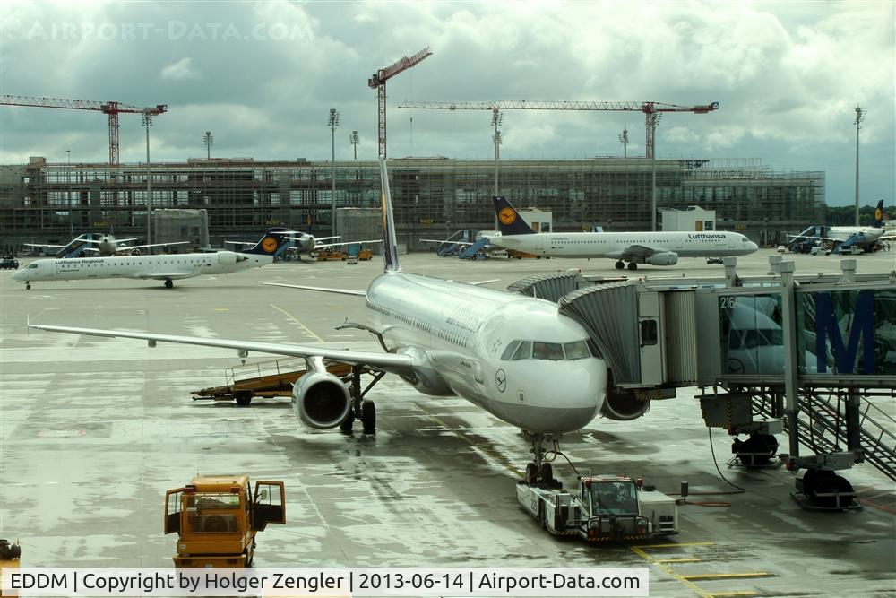 Munich International Airport (Franz Josef Strauß International Airport), Munich Germany (EDDM) - Coming, going, being at gate 216/1.....