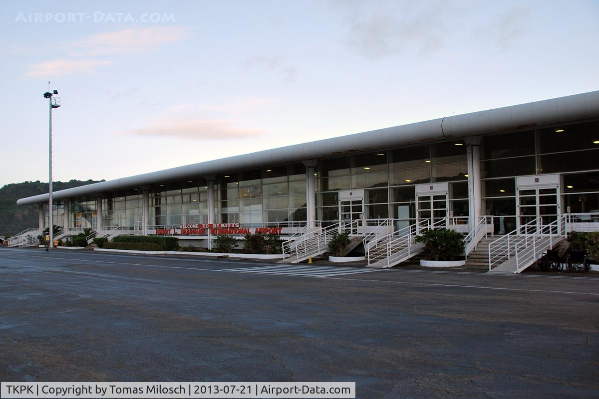 Robert L. Bradshaw International Airport, Basseterre, Saint Kitts Saint Kitts and Nevis (TKPK) - Walk from the aircraft to the main building after late evening arrival