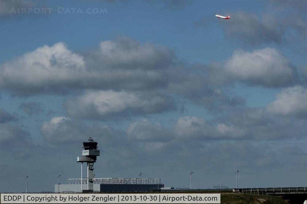 Leipzig/Halle Airport, Leipzig/Halle Germany (EDDP) - View from fence at southern rwy over twys Echo 7 and Echo 8 to Tower and AN 124 Hangar at apron 3 while outbound traffic has left via rwy 26R....