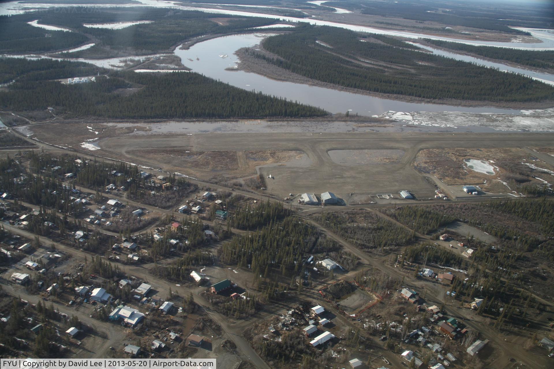 Fort Yukon Airport (FYU) - Fort Yukon, Alaska during breakup of the Yukon River prior to minor flooding of runway.  Taken from Wright Air N4637U piloted by Dave Lorring.