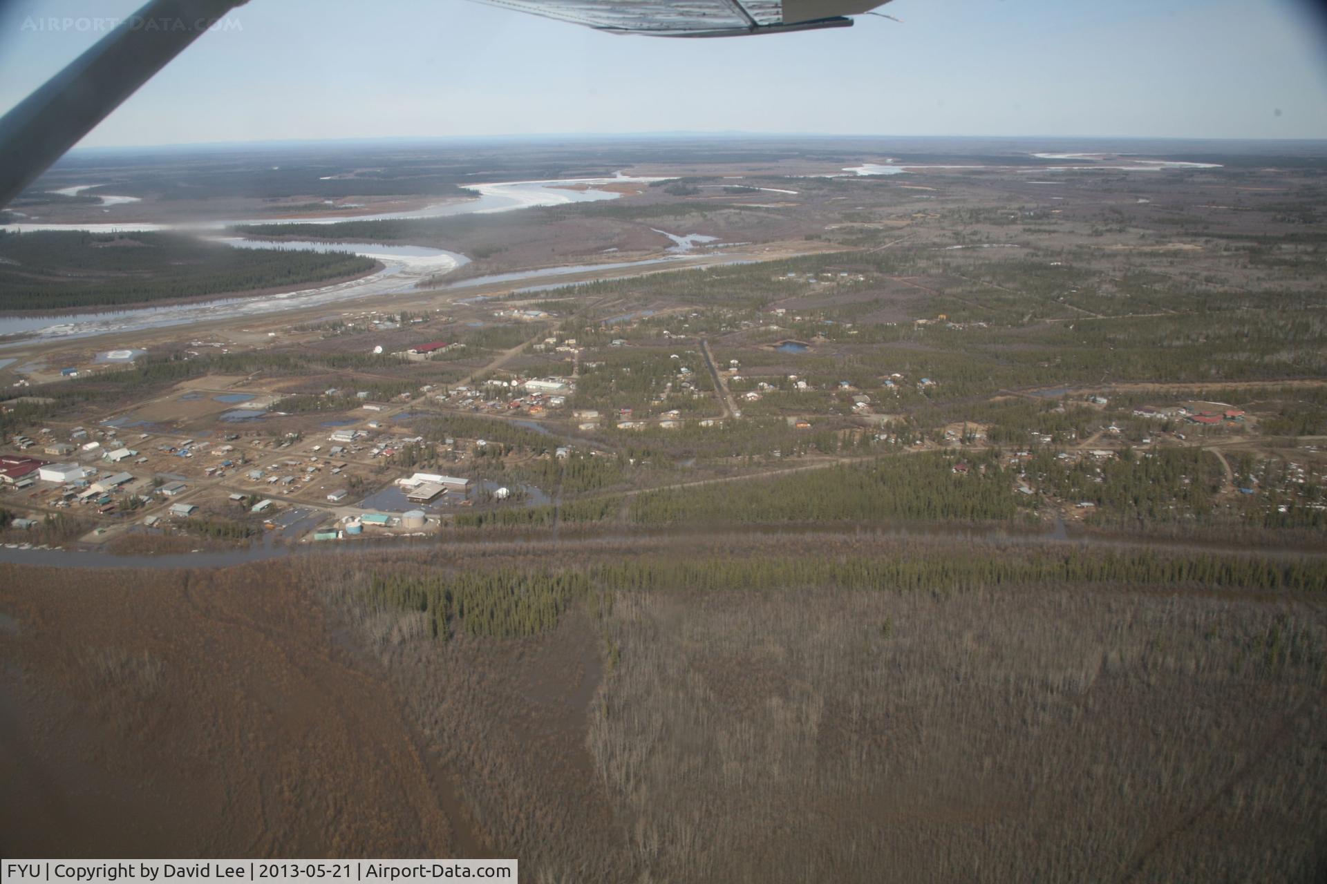 Fort Yukon Airport (FYU) - Fort Yukon, Alaska.  Minor flooding during breakup of Yukon River.  Taken from Wright Air N4637U piloted by Dave Lorring.