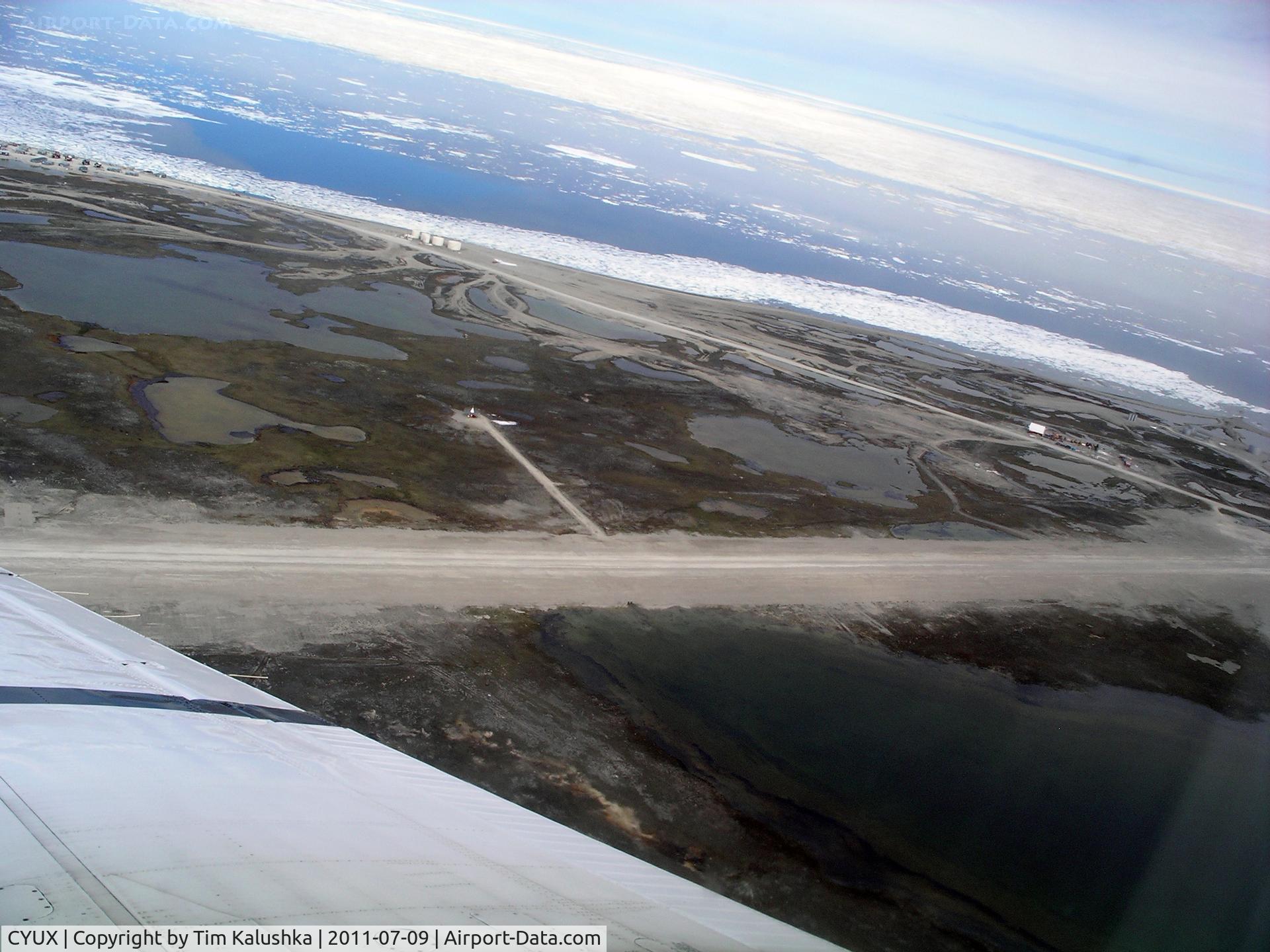Hall Beach Airport, Hall Beach, Nunavut Canada (CYUX) - Looking over the airport flying down runway 304T Hall Beach