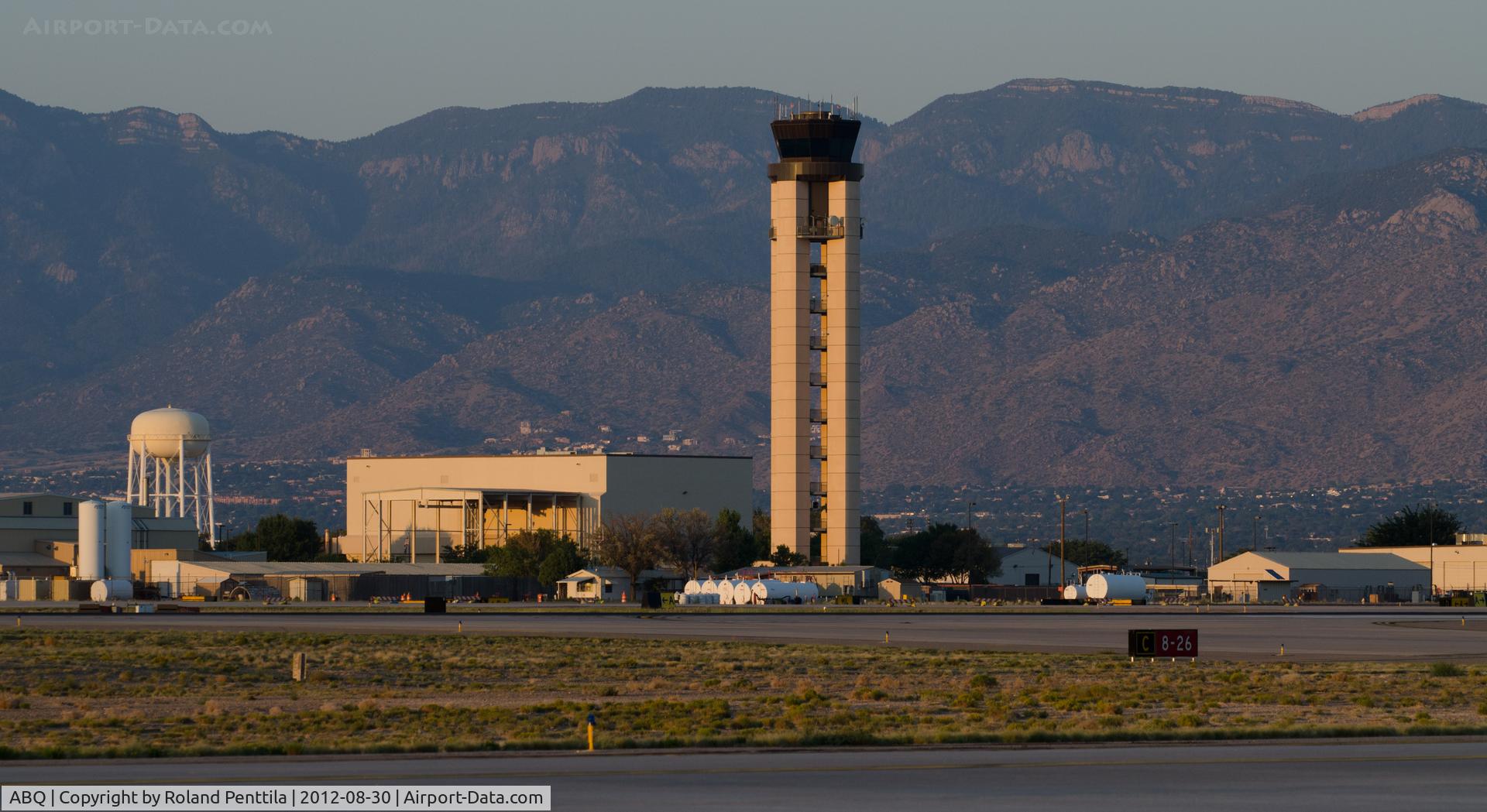 Albuquerque International Sunport Airport (ABQ) - The control tower at evening.  The tower controls both domestic and military operations as this airport is jointly used by Kirtland Air Force Base.