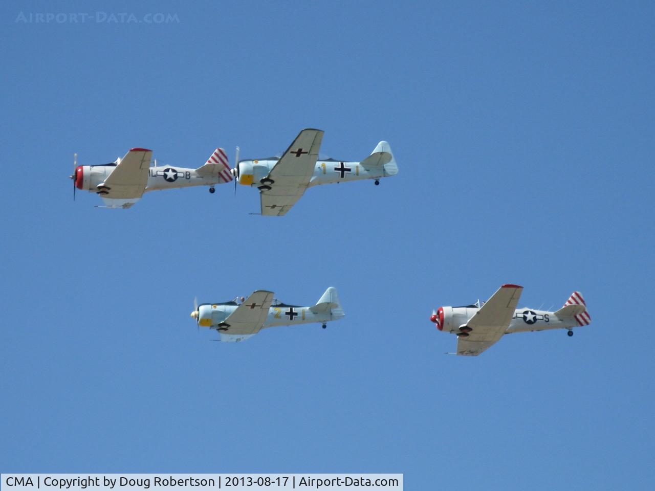 Camarillo Airport (CMA) - Condor Squadron fast pass over Rwy 26 at Wings Over Camarillo Airshow 2013. The Condor Squadron has many members with T-6 TEXAN and SNJ North American Aviation military trainer aircraft