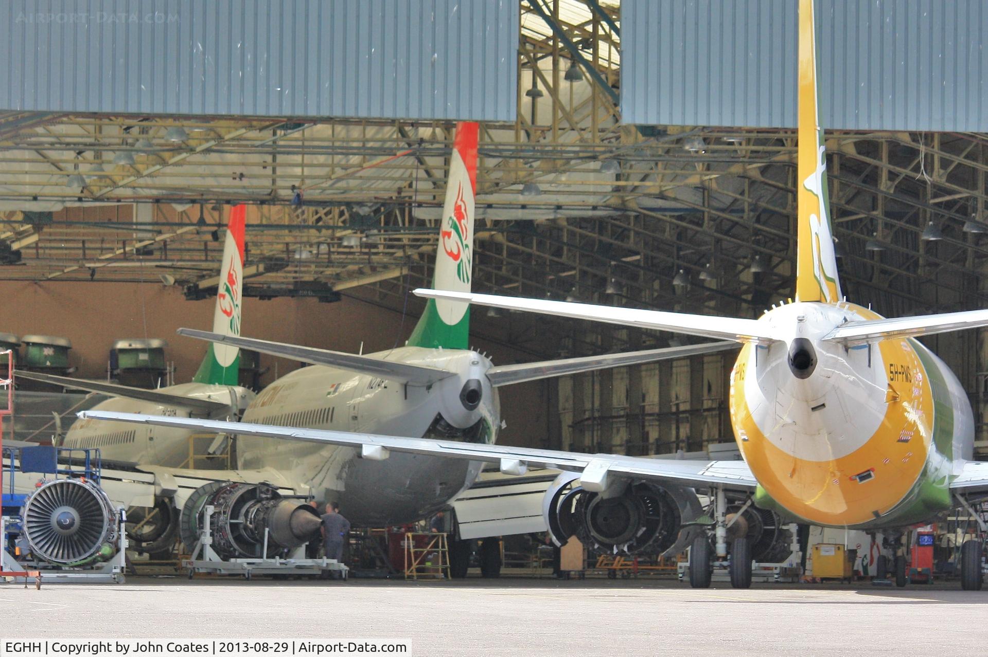 Bournemouth Airport, Bournemouth, England United Kingdom (EGHH) - B735s being prepared for ill-fated Solyom Hungarian Airways whilst Precision Air looks on.
