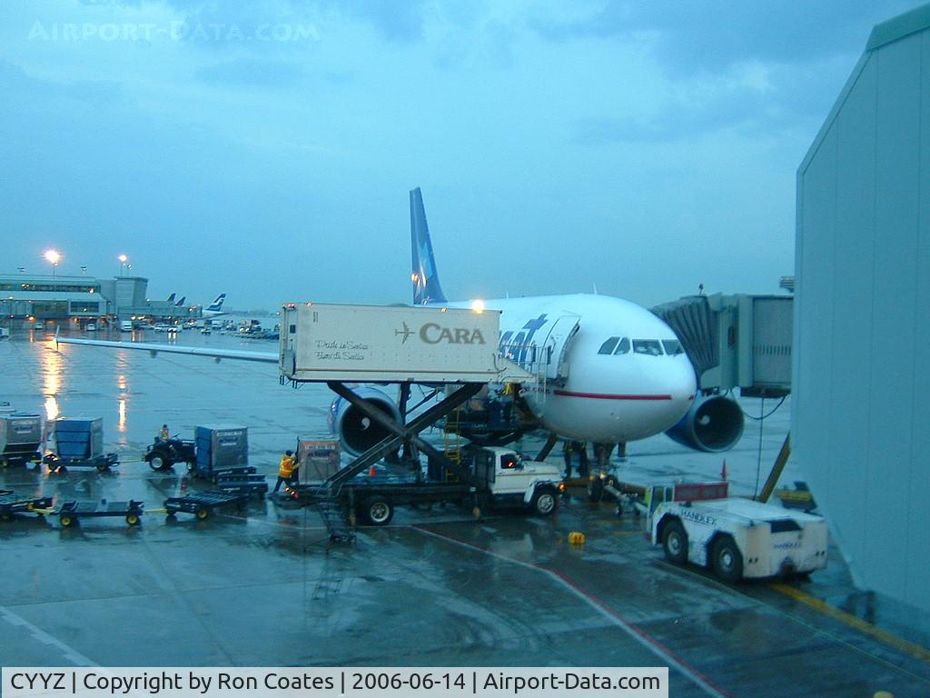 Toronto Pearson International Airport (Toronto/Lester B. Pearson International Airport, Pearson Airport), Toronto, Ontario Canada (CYYZ) - A busy and wet evening on the ramp at Toronto's Lester B Pearson Int'l Airport