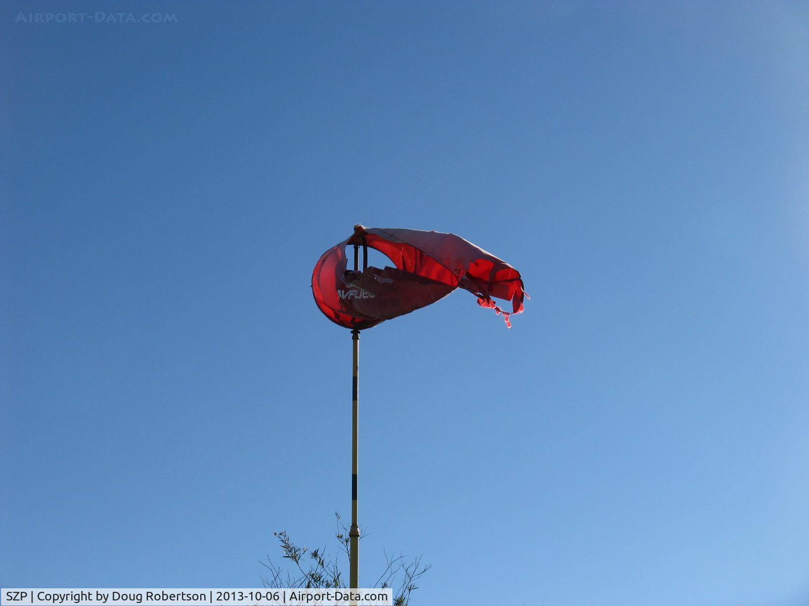 Santa Paula Airport (SZP) - Rwy 04 Windsock, a bit tattered in strong santana wind gusts-since replaced with new