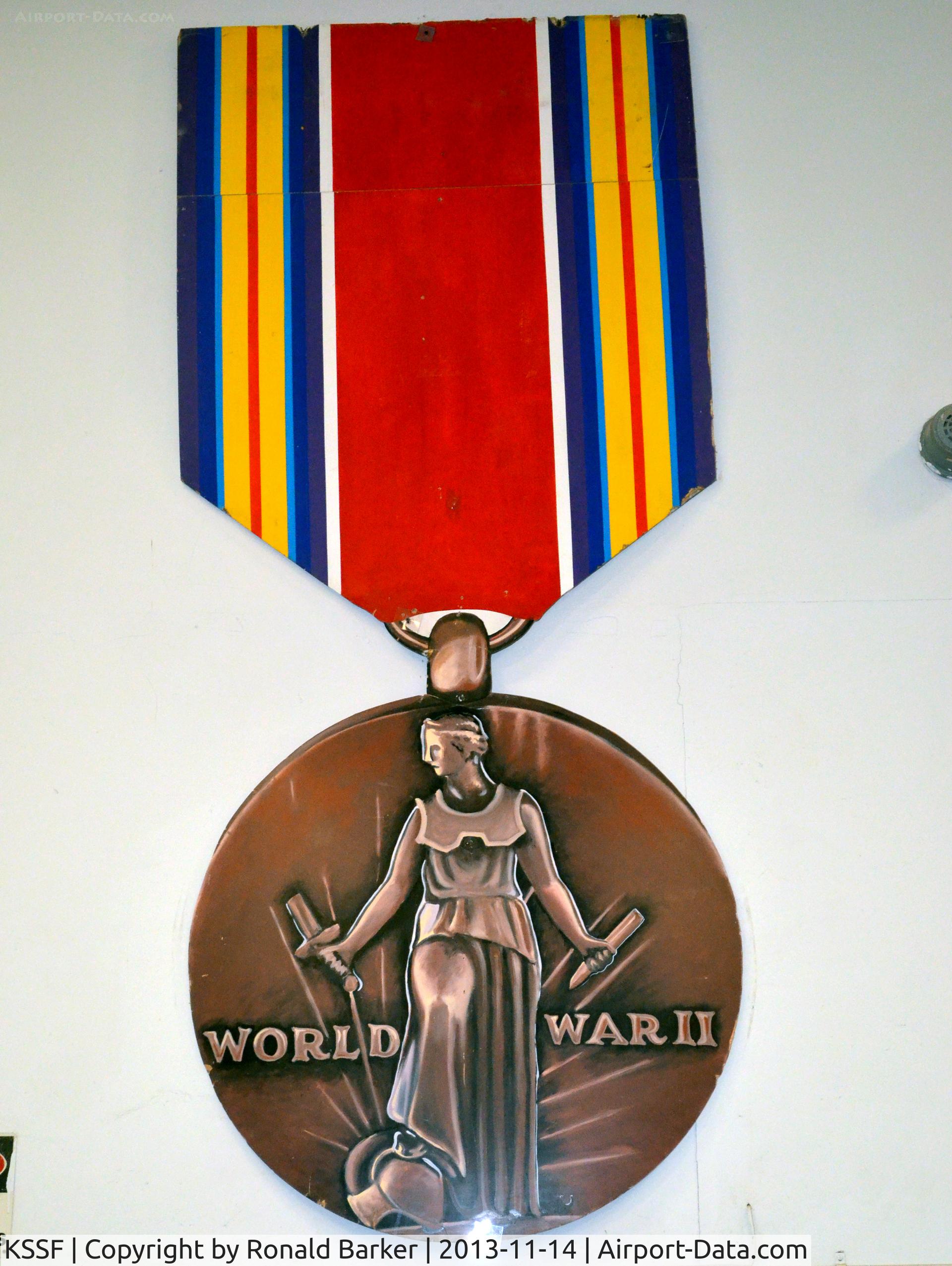 Stinson Municipal Airport (SSF) - Giant size US World War II Victory Medal at the Texas Air Museum