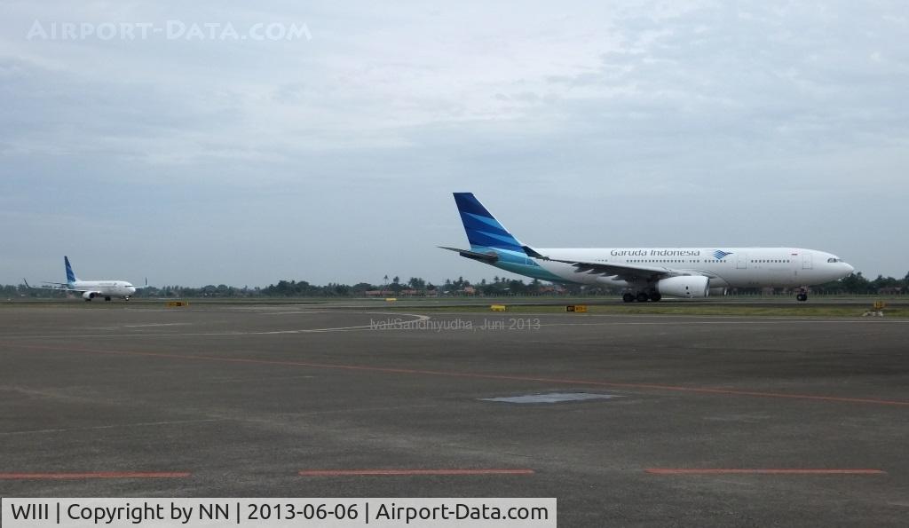 Soekarno-Hatta International Airport, Cengkareng, Banten (near Jakarta) Indonesia (WIII) - Aircrafts queue on taxiway at SOEKARNO-HATTA International Airport Jakarta. In 2012 / 2013 CGK has ranked 9th bussiest airport in the world (link : http://www.world-airport-codes.com/world-top-30-airports.html  )