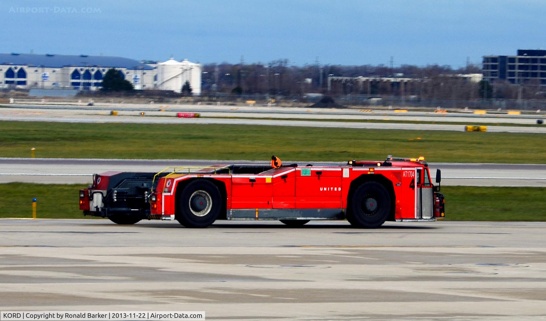 Chicago O'hare International Airport (ORD) - Large tug number AT1704 O'Hare